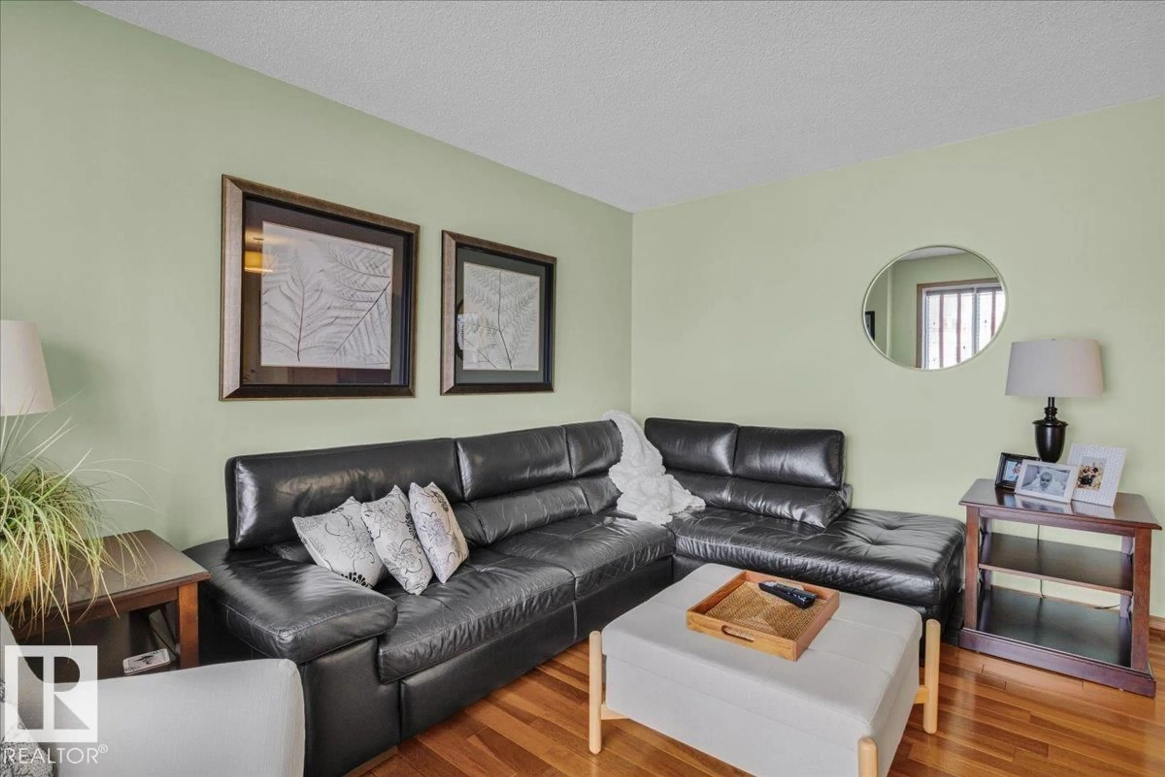 Living room with furniture, wood/laminate floor for 5316 53 AV, Mundare Alberta T0B3H0