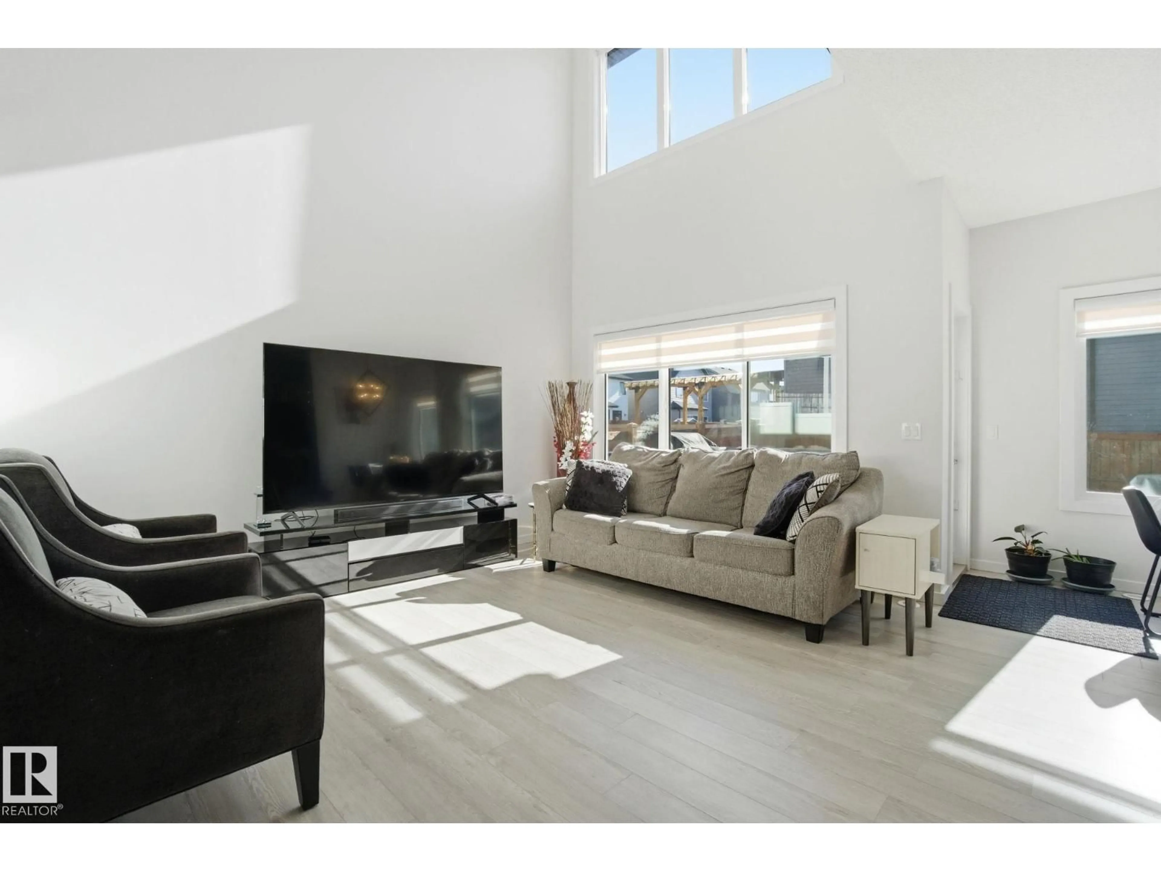 Living room with furniture, unknown for SW - 15851 22 AV, Edmonton Alberta T6W4K9