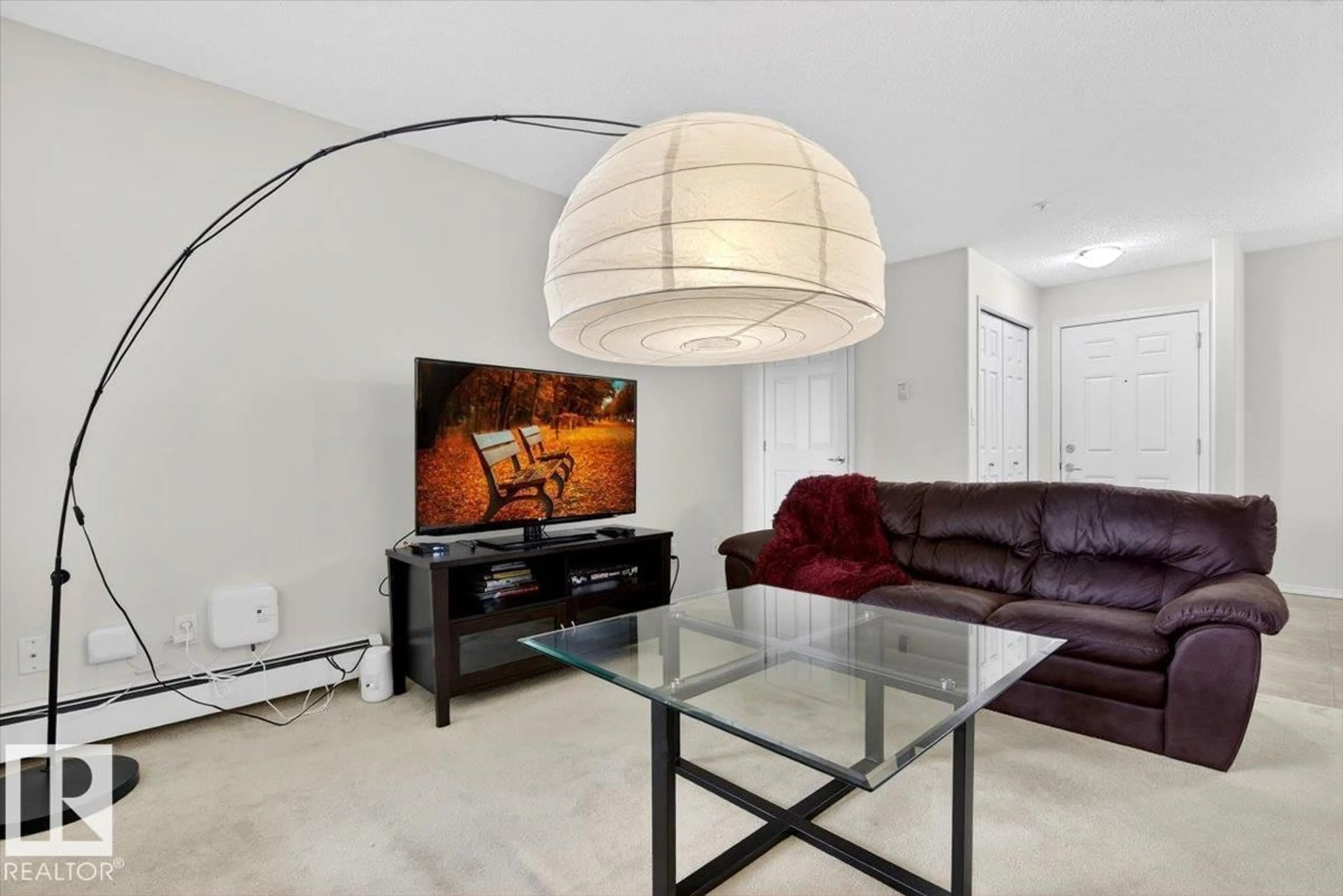 Living room with furniture, unknown for #322 - 13625 34 ST, Edmonton Alberta T5A0E3