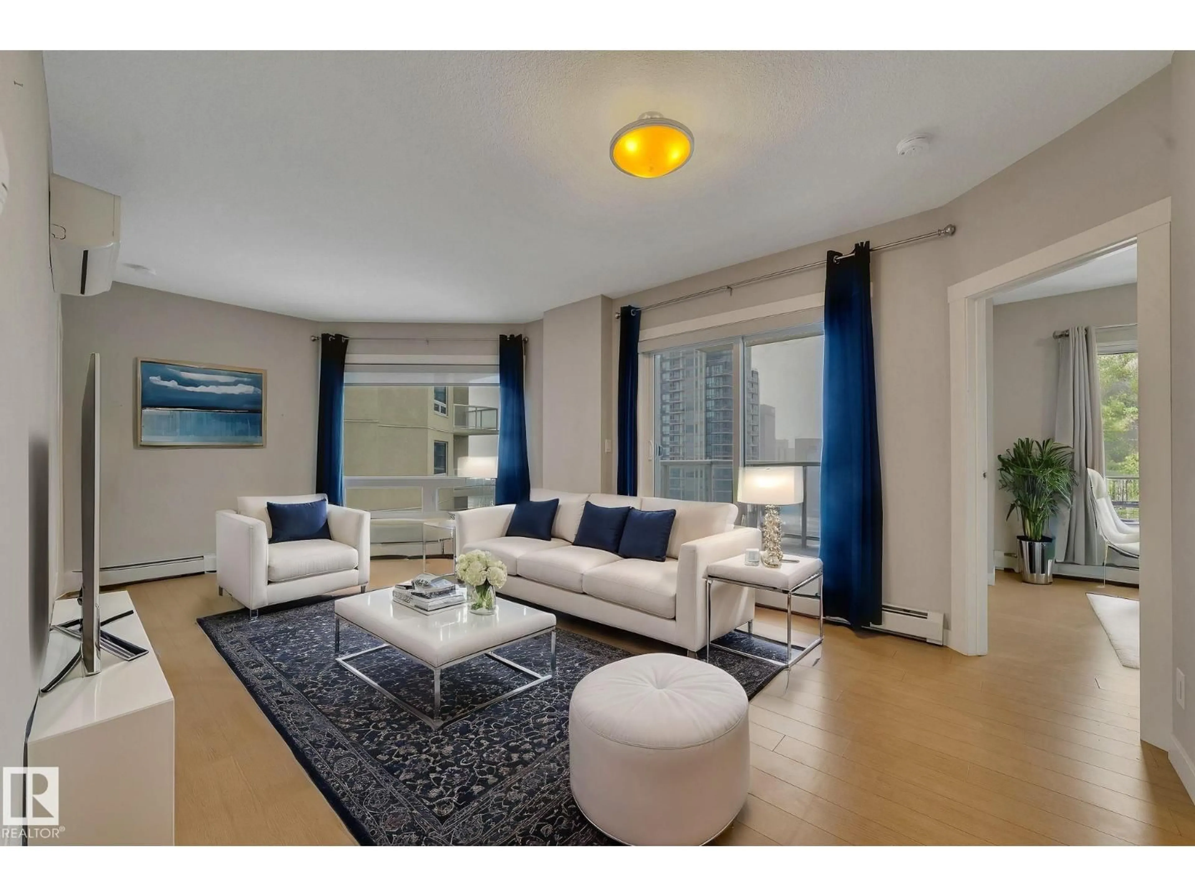 Living room with furniture, unknown for 2107 10410 102 AV AV, Edmonton Alberta T5J0E9