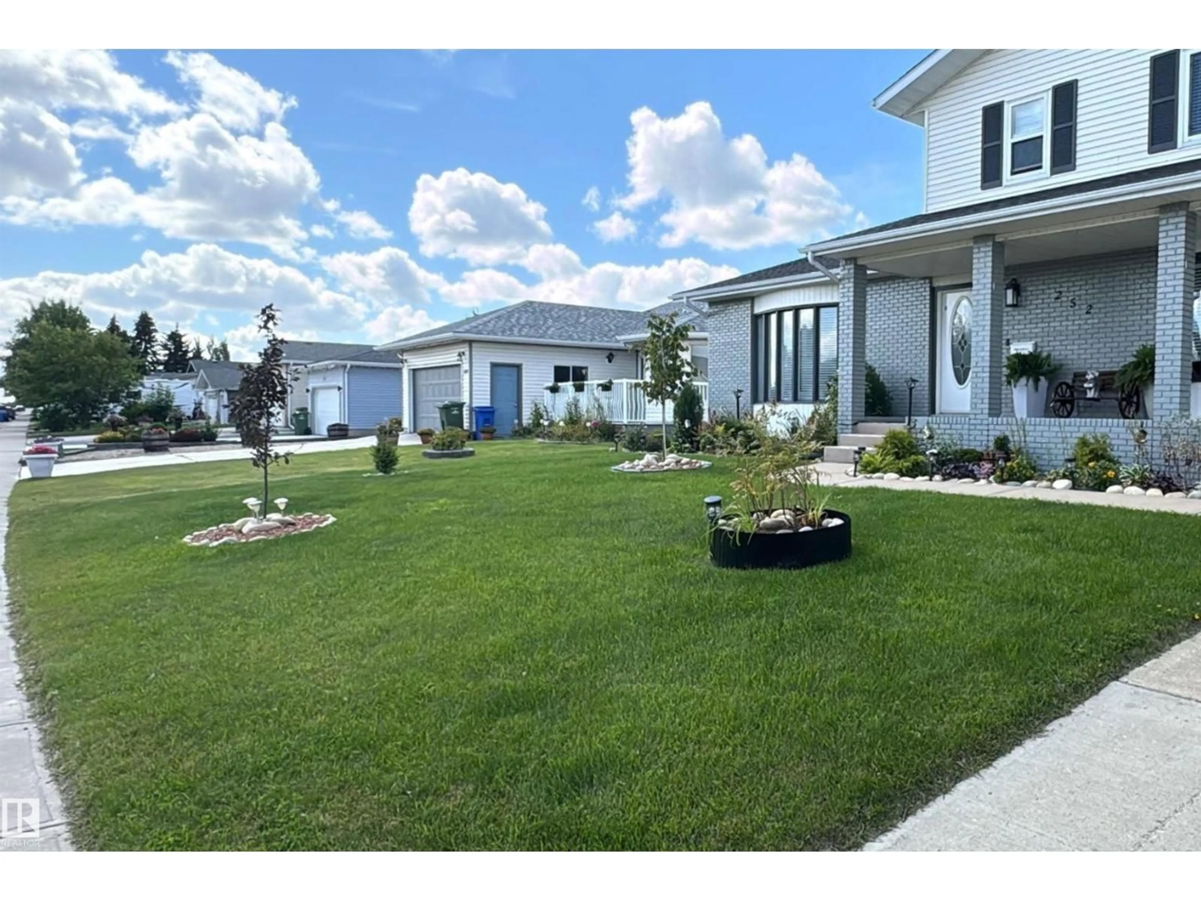 A pic from outside/outdoor area/front of a property/back of a property/a pic from drone, unknown for 252 PARKSIDE DR, Wetaskiwin Alberta T9A3K2