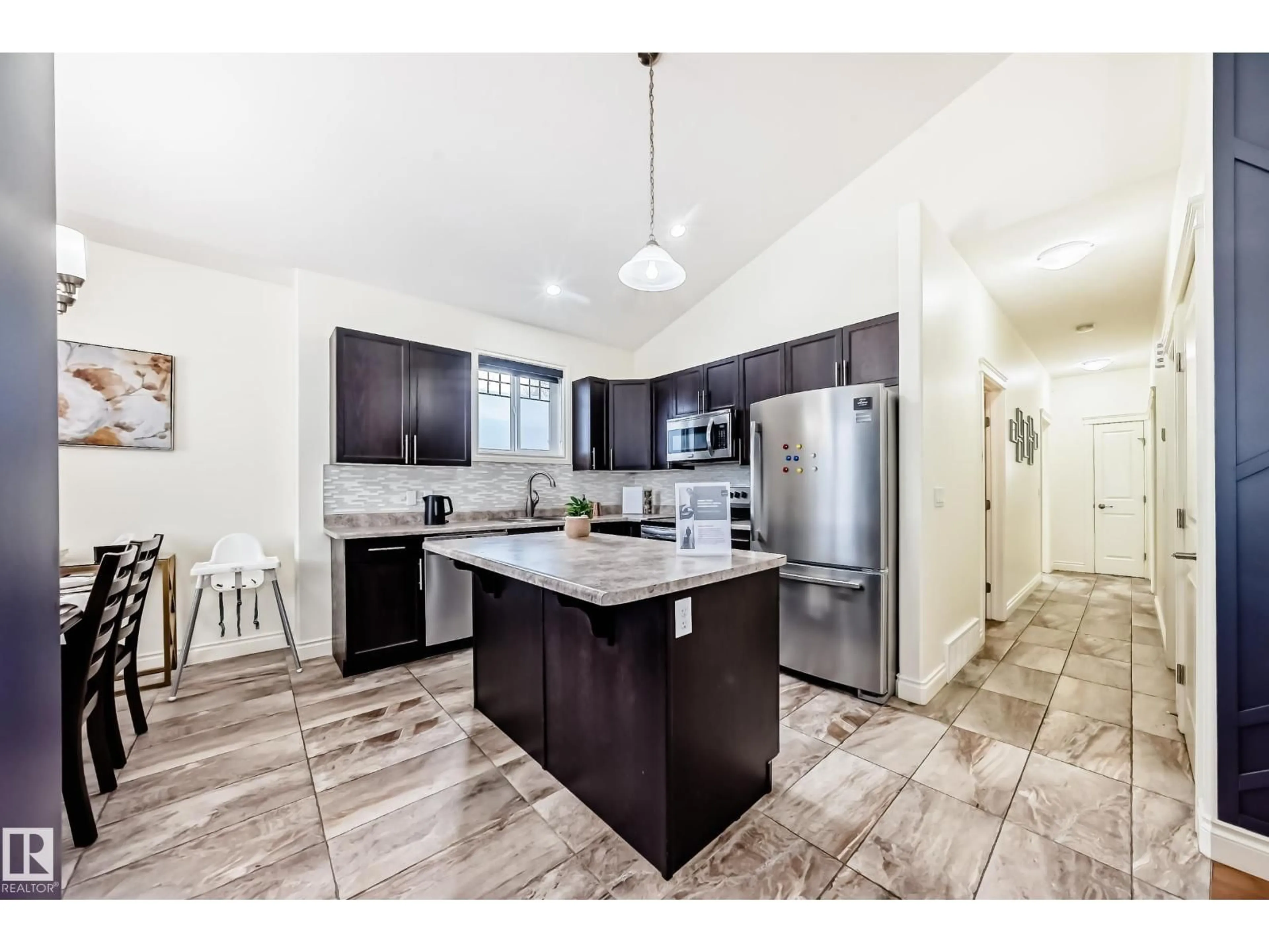 Open concept kitchen, ceramic/tile floor for 11410 92 STREET, Edmonton Alberta T5G0Z5