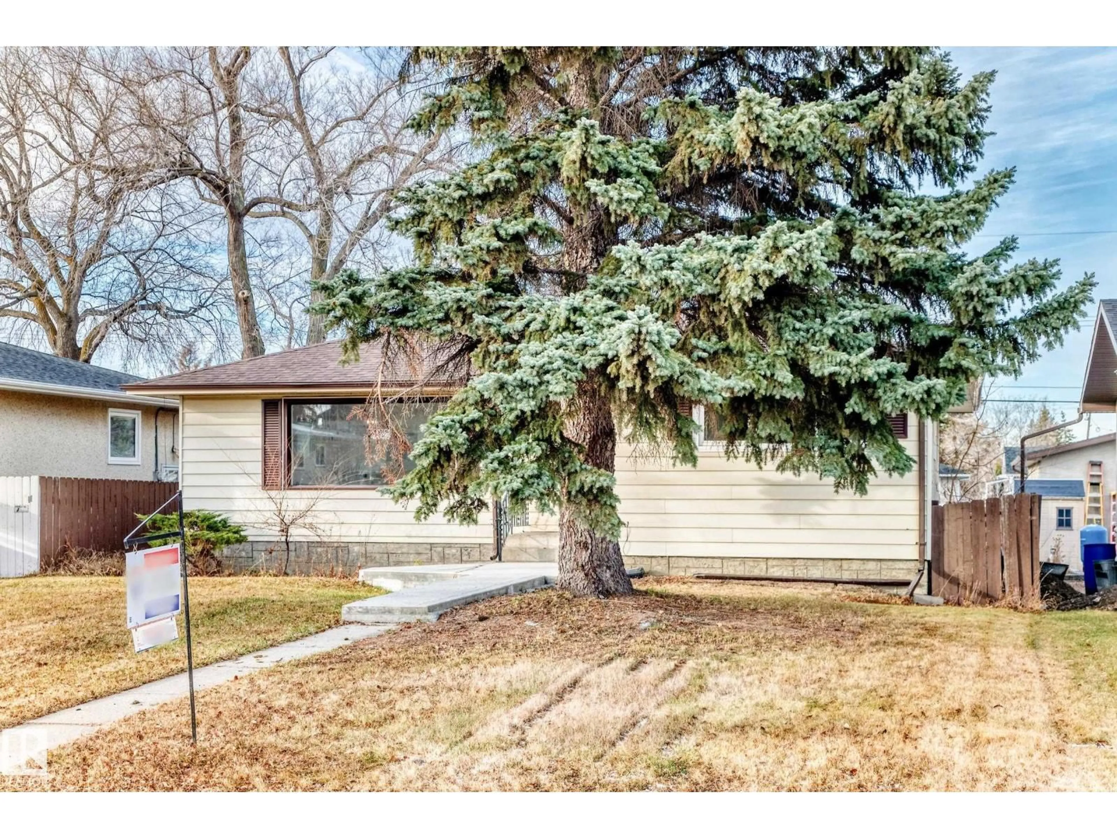 Home with vinyl exterior material, street for 9126 152 ST, Edmonton Alberta T5R1M4