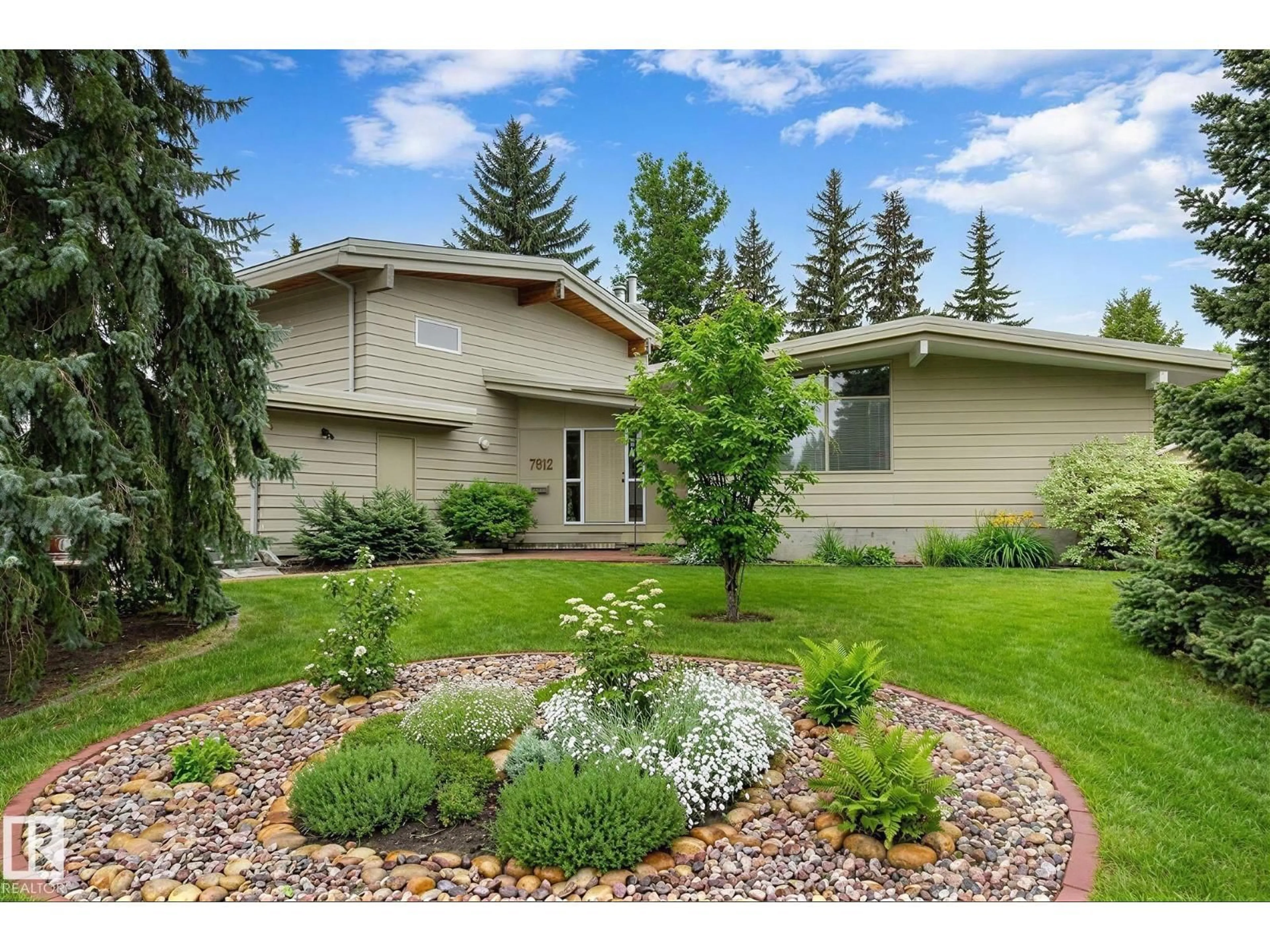 Home with vinyl exterior material, street for 7812 143 ST, Edmonton Alberta T5R0N6