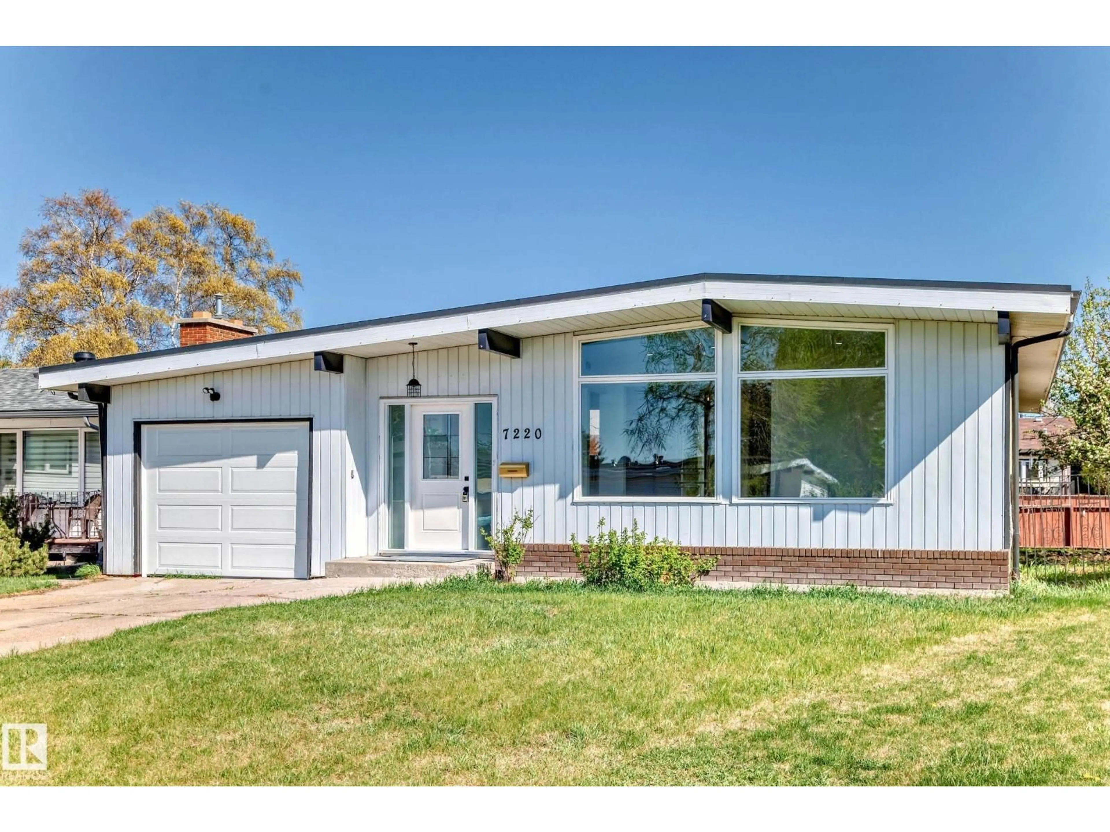 Home with vinyl exterior material, street for 7220 152A AVE, Edmonton Alberta T5C2Z4