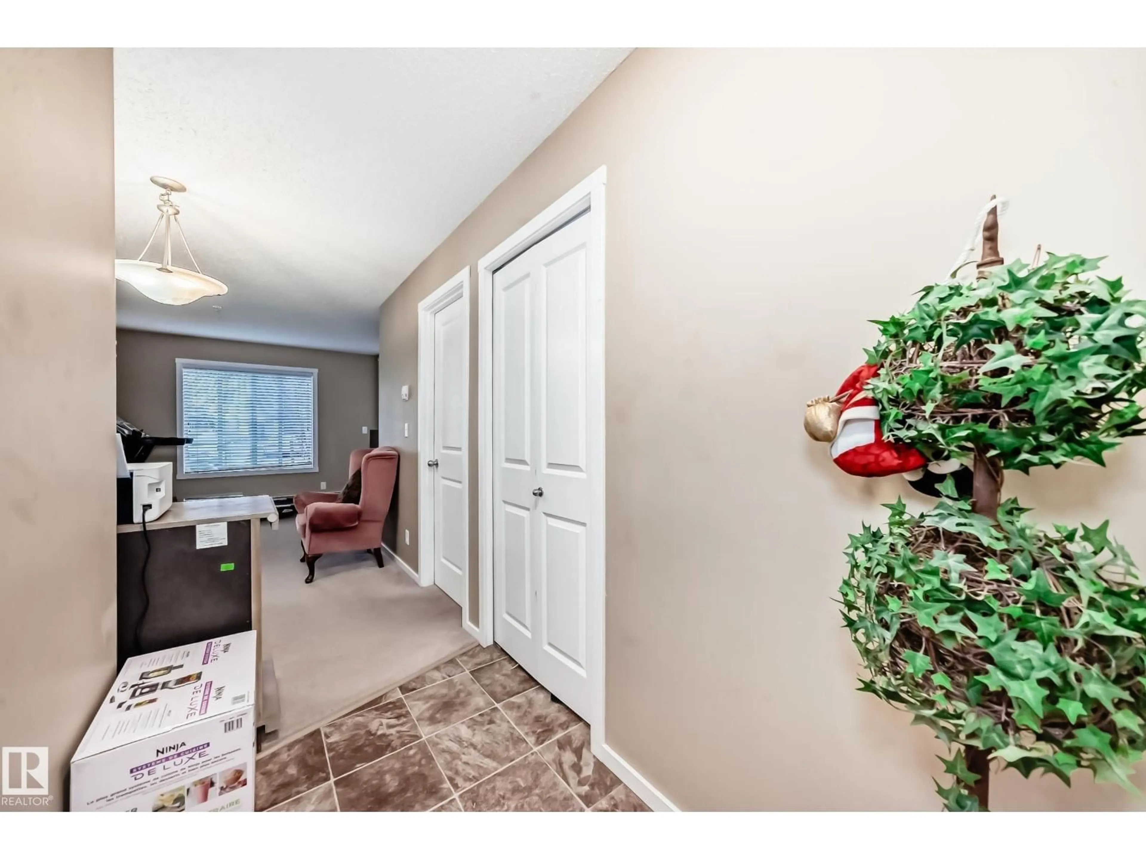 Indoor entryway for #116 - 5810 MULLEN PL, Edmonton Alberta T6R0W3