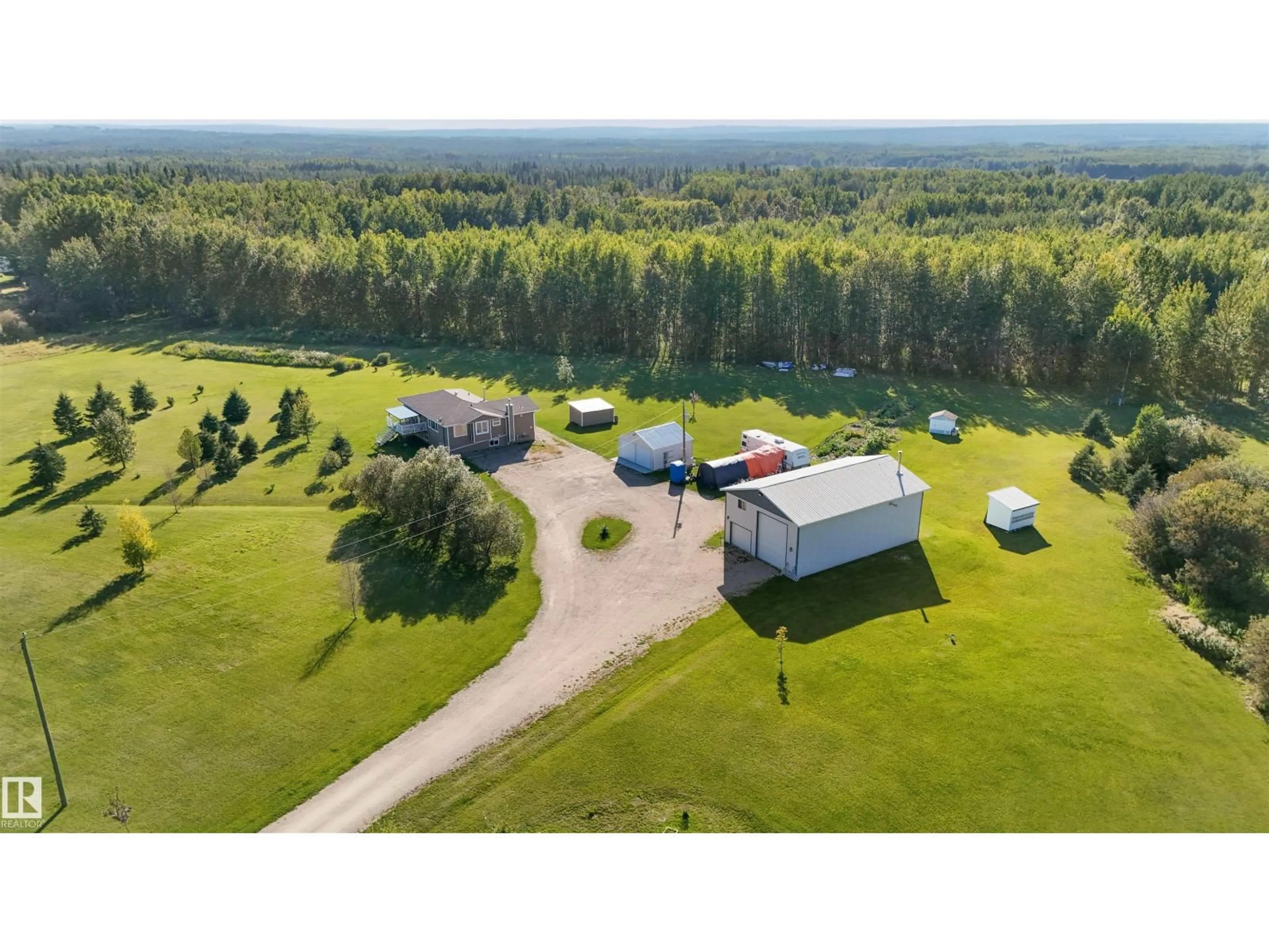 A pic from outside/outdoor area/front of a property/back of a property/a pic from drone, water/lake/river/ocean view for 49208 RANGE ROAD 84, Rural Brazeau County Alberta T7A2A3