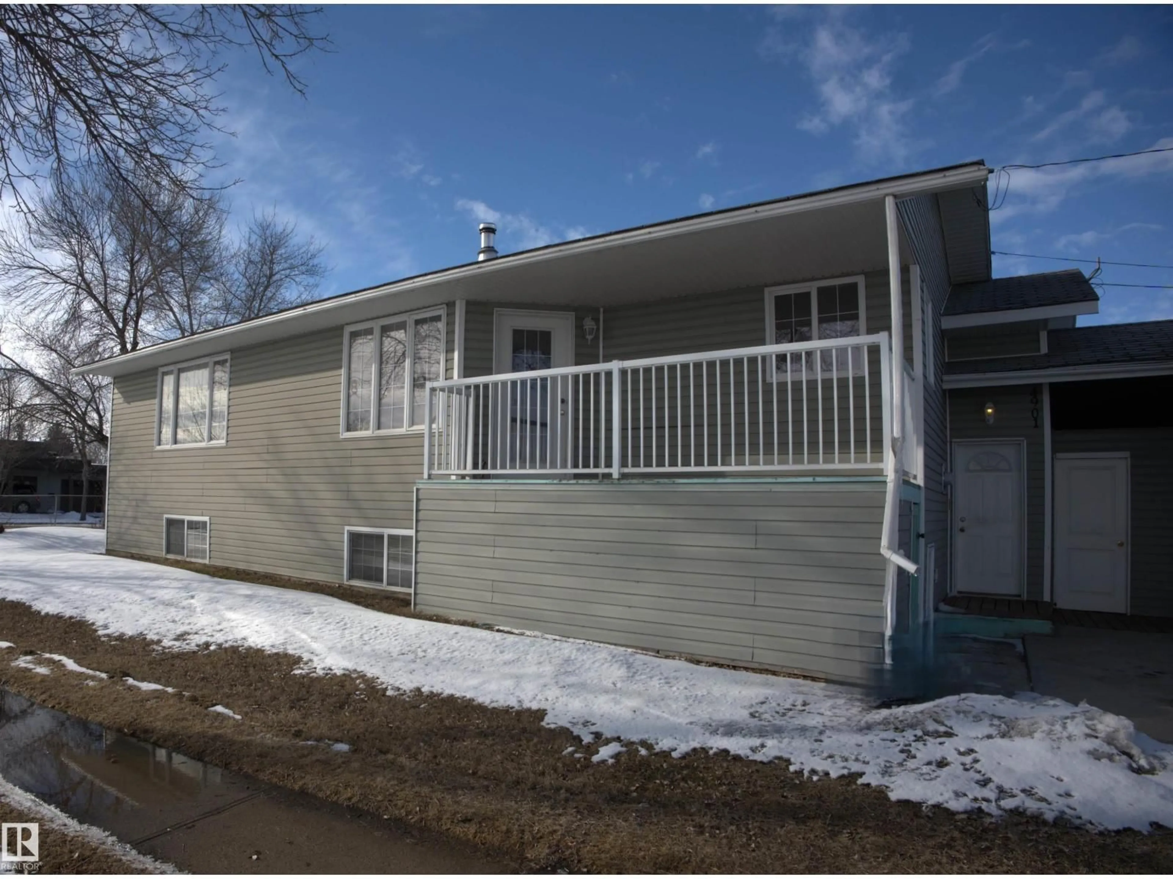 Home with vinyl exterior material, street for 4901 52 ST, Bonnyville Town Alberta T9N1X7