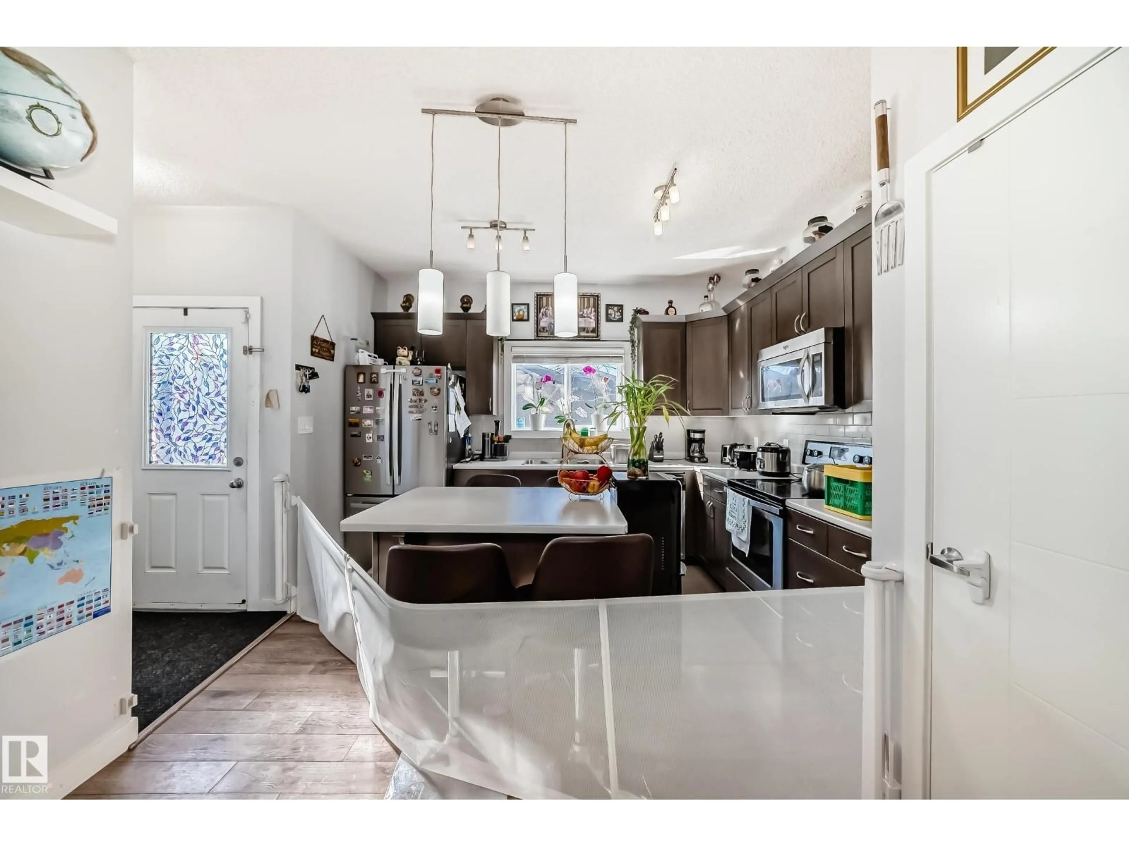 Open concept kitchen, ceramic/tile floor for 8204 224 NW, Edmonton Alberta T5T7A1