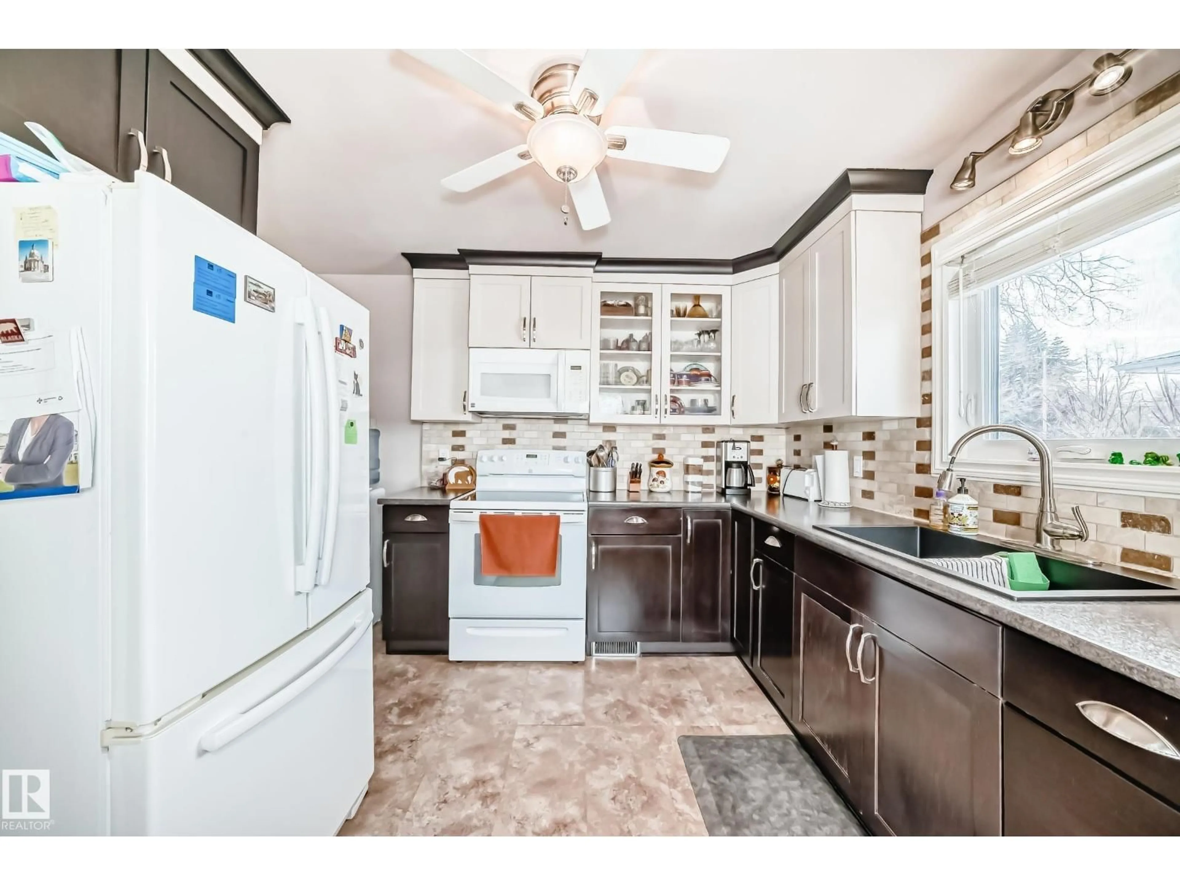 Open concept kitchen, ceramic/tile floor for 3634 113 AV, Edmonton Alberta T5W0P8