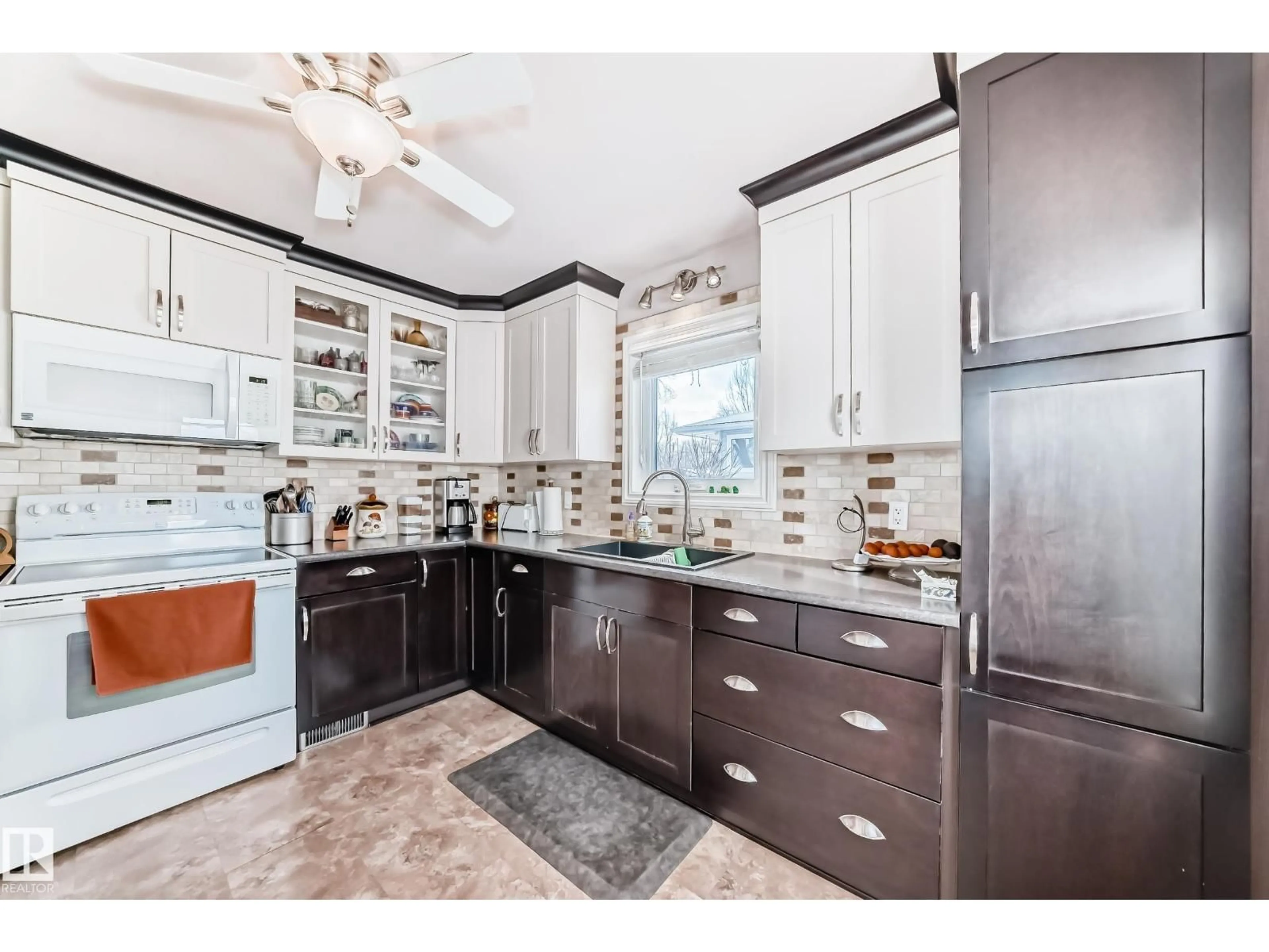 Open concept kitchen, ceramic/tile floor for 3634 113 AV, Edmonton Alberta T5W0P8