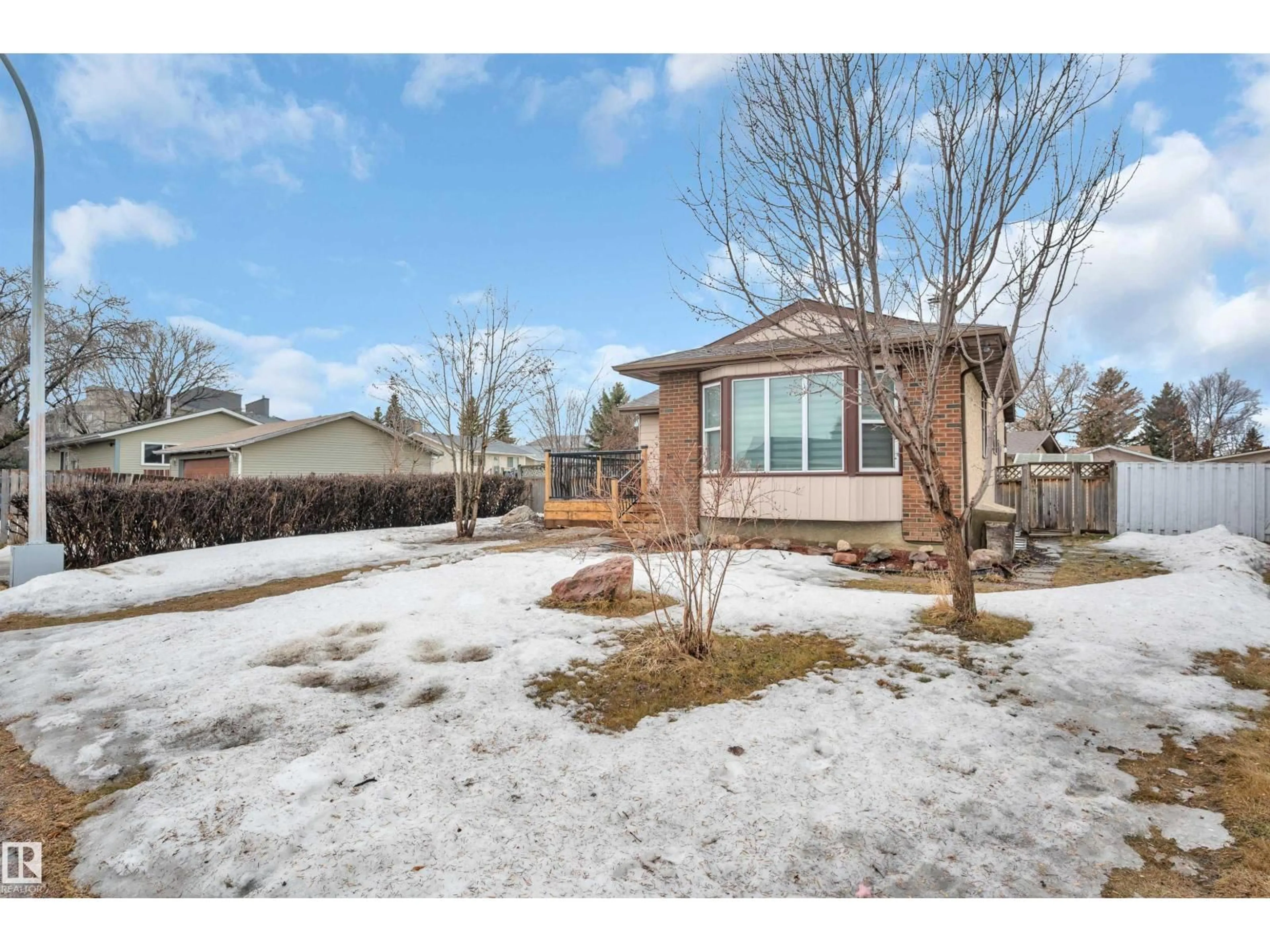 Home with brick exterior material, street for NW - 2010 46 ST, Edmonton Alberta T6L2T5