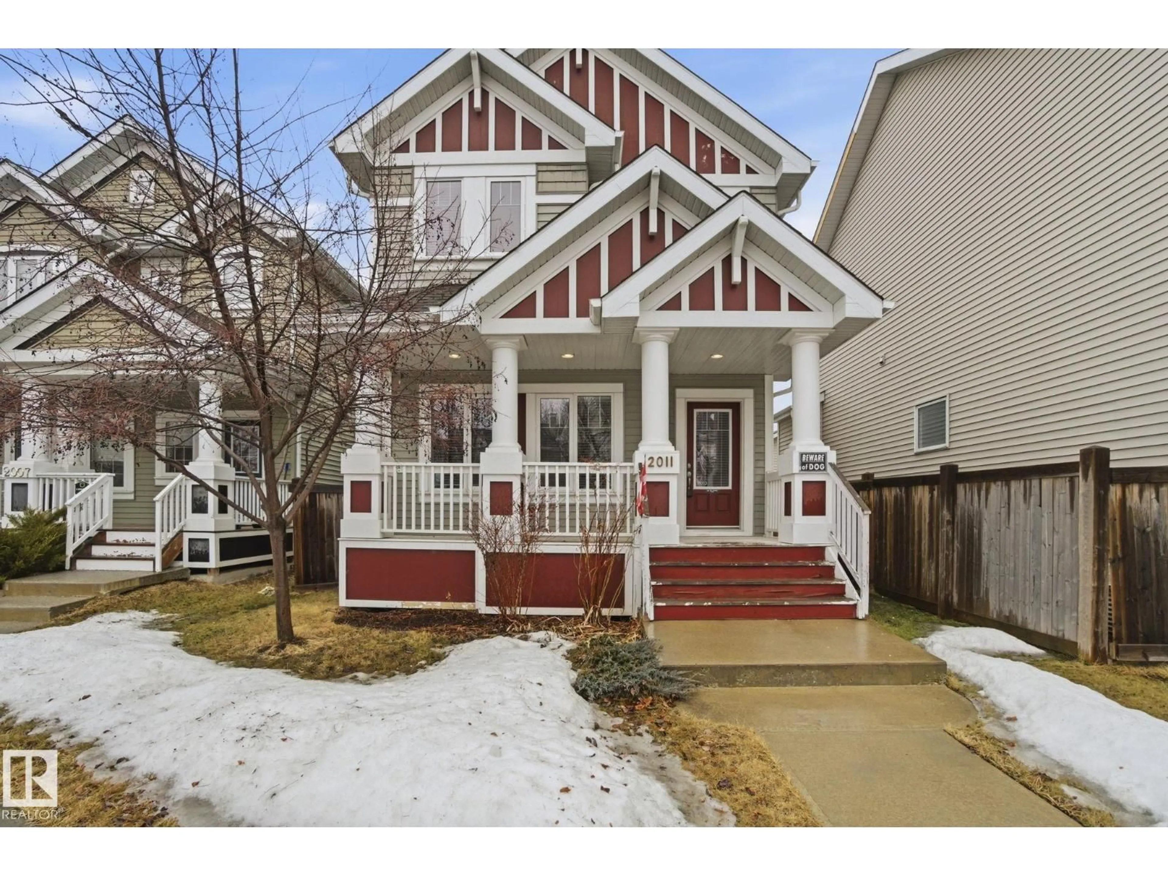 Home with vinyl exterior material, street for SW - 2011 72 ST, Edmonton Alberta T6X0L5