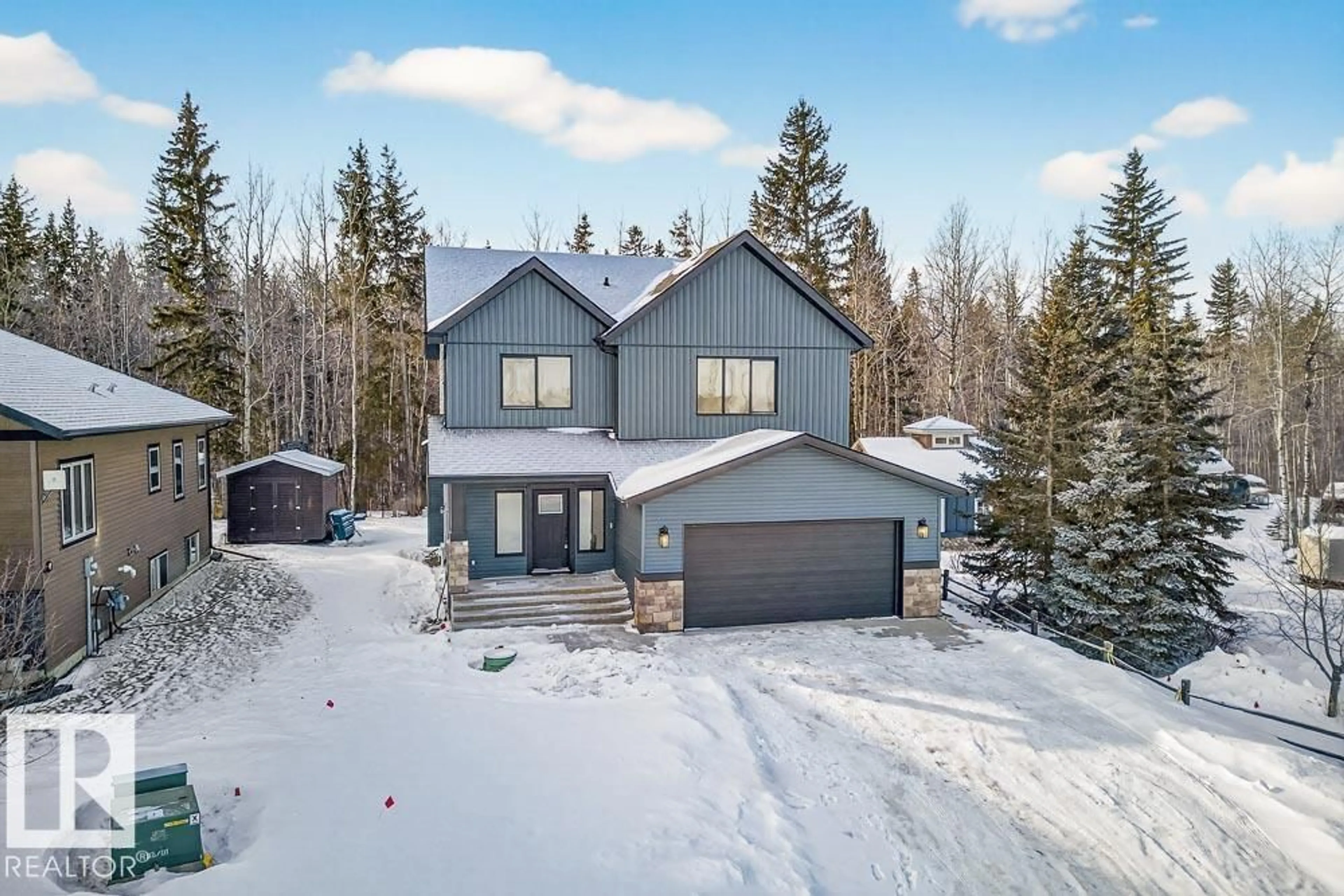 A pic from outside/outdoor area/front of a property/back of a property/a pic from drone, street for 132 HERON POINT CL, Rural Wetaskiwin County Alberta T0C2V0