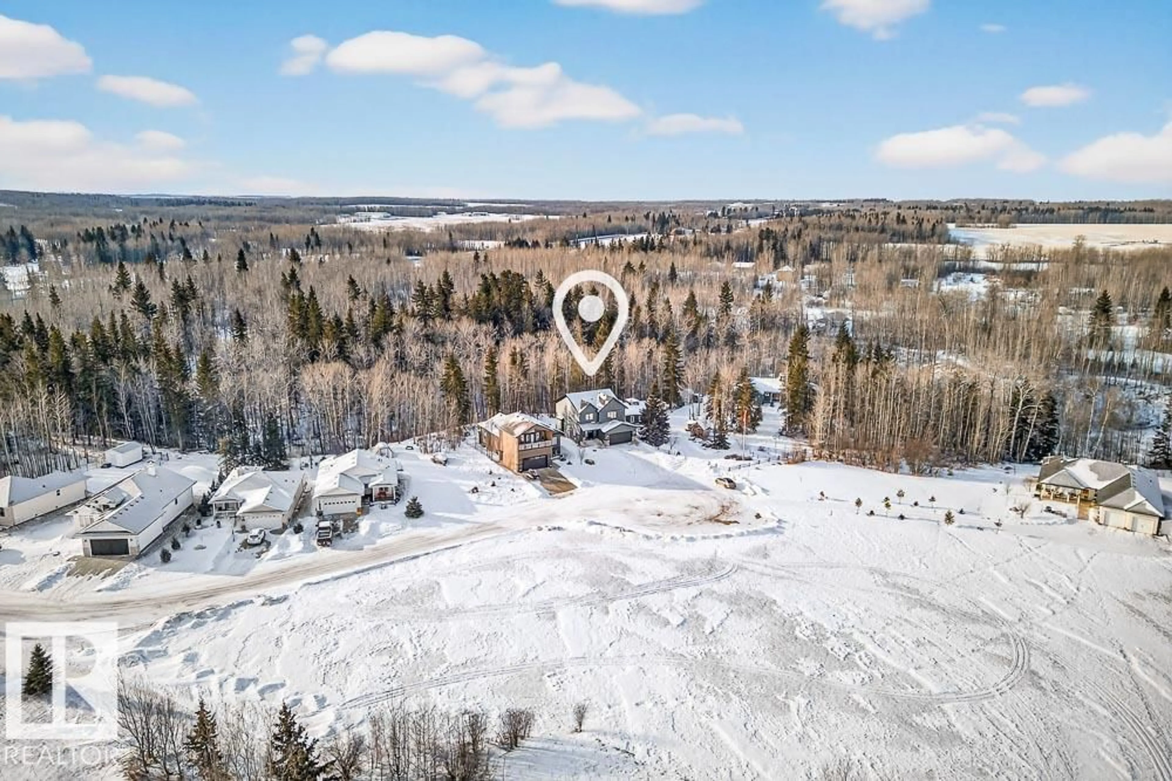 A pic from outside/outdoor area/front of a property/back of a property/a pic from drone, forest/trees view for 132 HERON POINT CL, Rural Wetaskiwin County Alberta T0C2V0