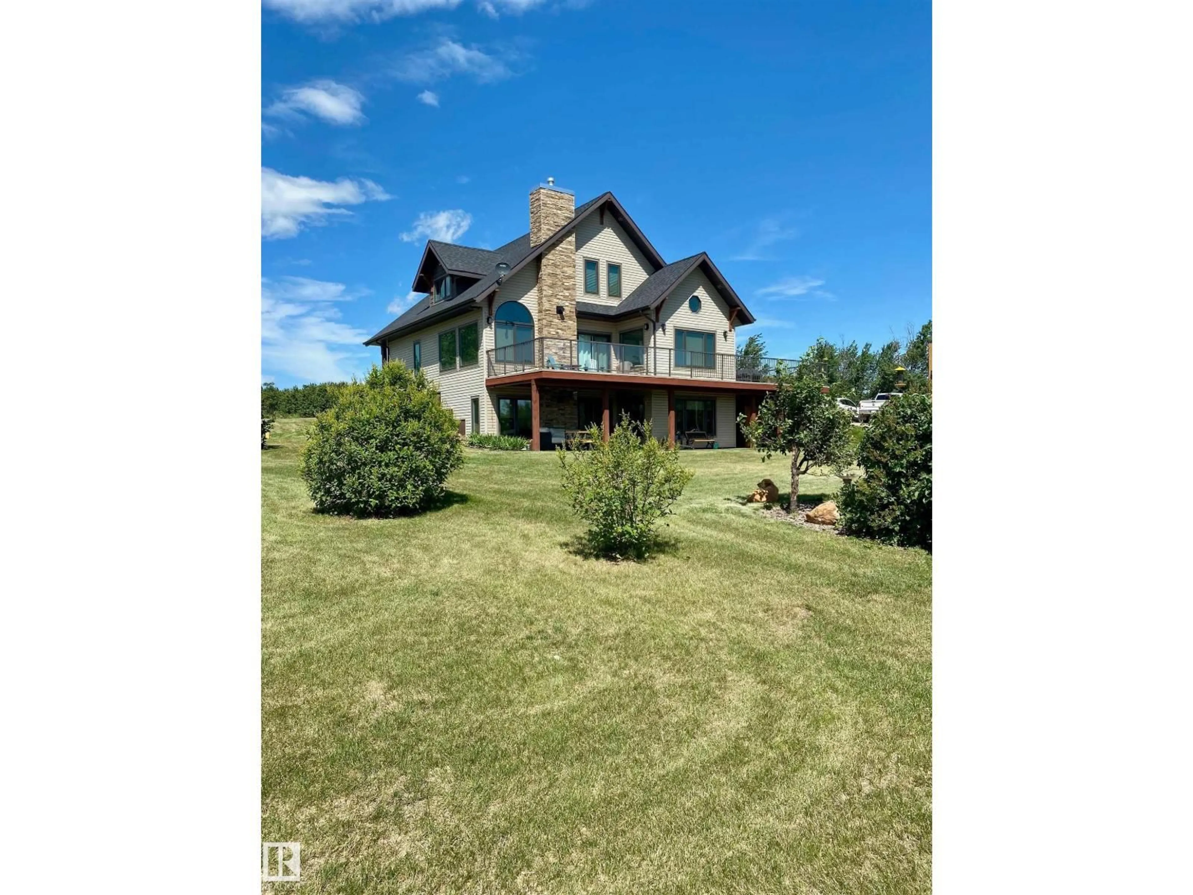 A pic from outside/outdoor area/front of a property/back of a property/a pic from drone, unknown for 34 - 562115 RR 114, Rural Two Hills County Alberta T0B4K0