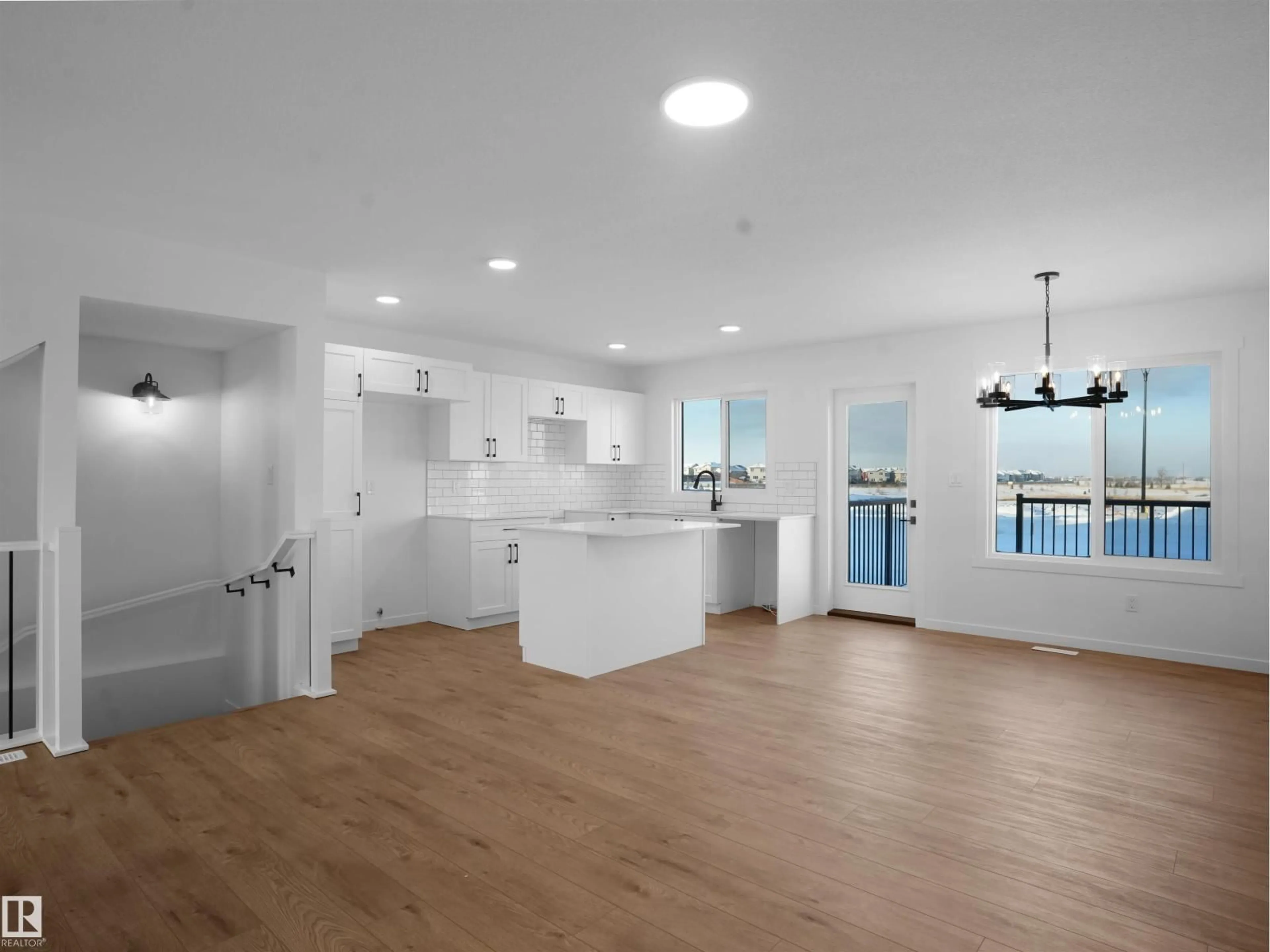 Open concept kitchen, wood/laminate floor for #24 - 1430 ASTER WY, Edmonton Alberta T6T2N8