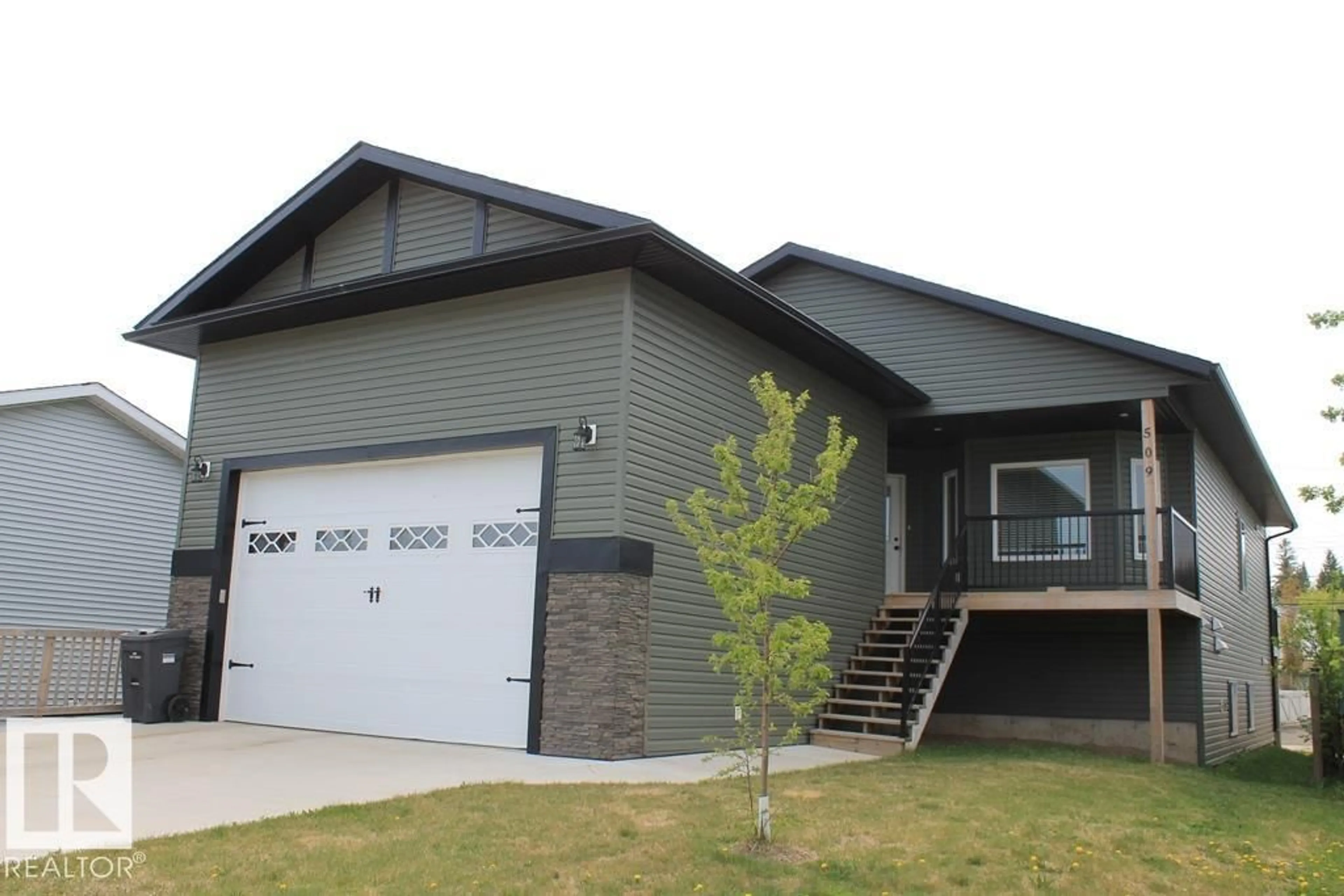 Home with vinyl exterior material, street for 509 13 ST, Cold Lake Alberta T9M1B3