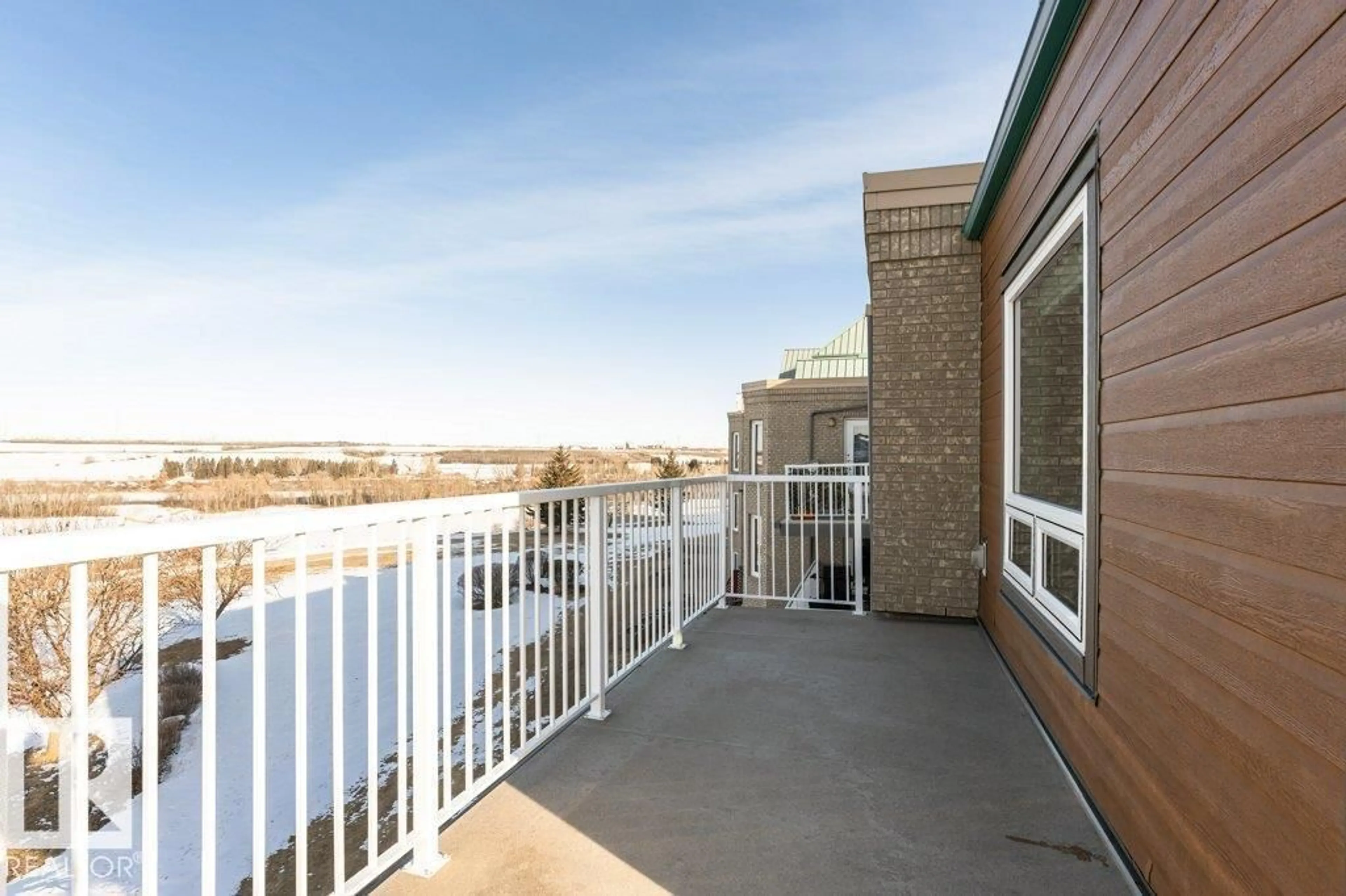 Patio, water/lake/river/ocean view for 301 - 9926 100 AV, Fort Saskatchewan Alberta T8L4E3