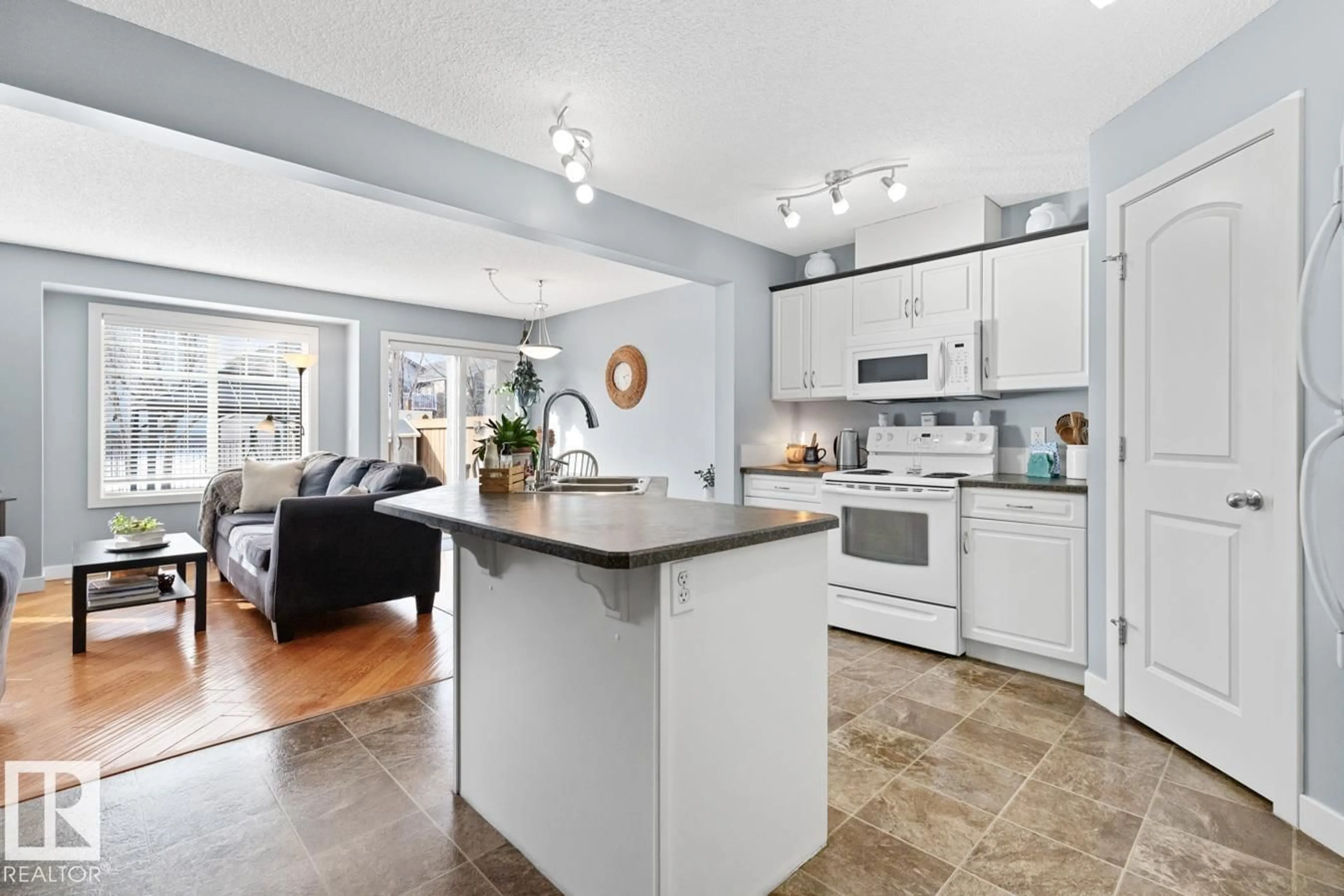 Open concept kitchen, ceramic/tile floor for #7 - 14208 36 ST, Edmonton Alberta T5Y0E4