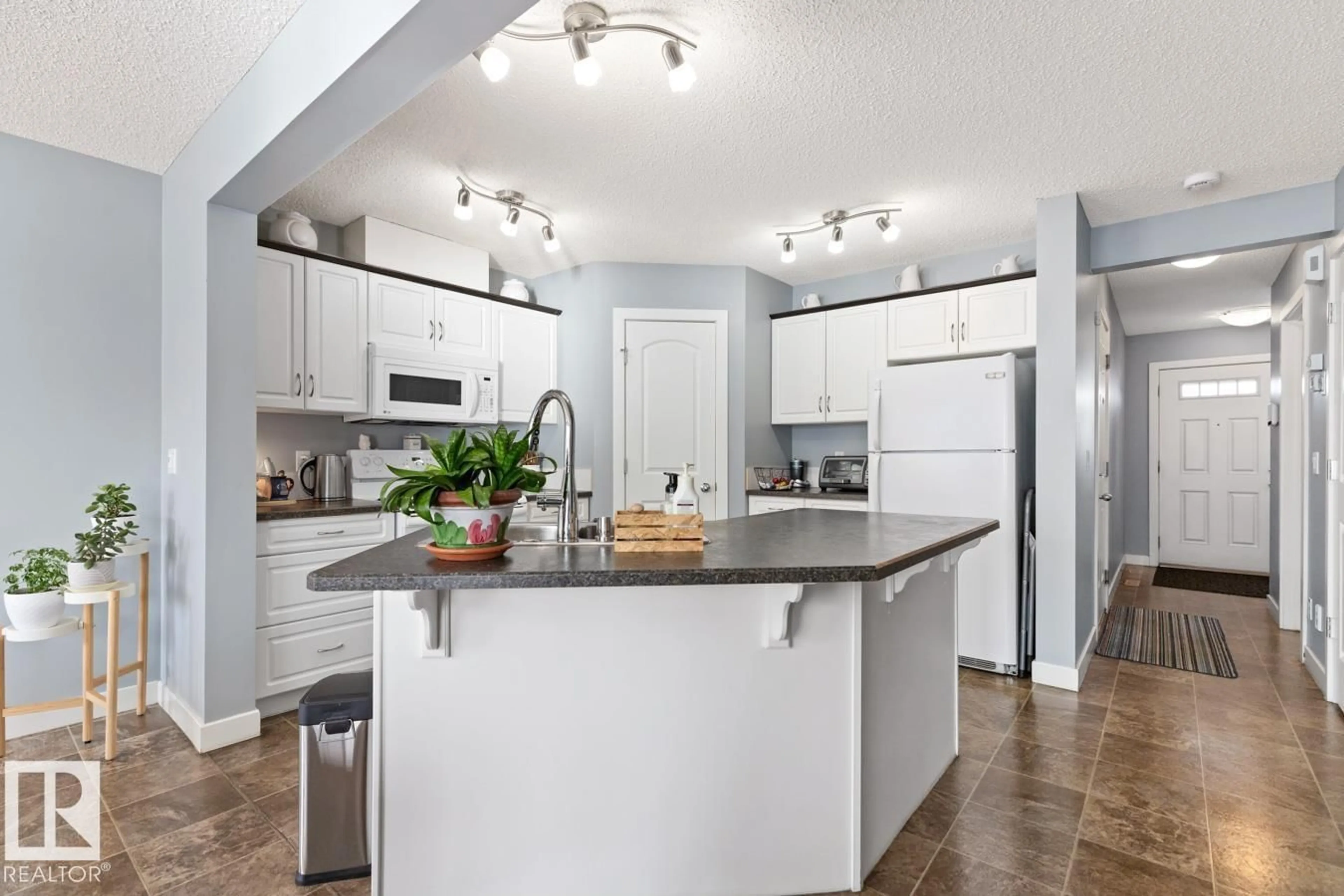 Open concept kitchen, unknown for #7 - 14208 36 ST, Edmonton Alberta T5Y0E4
