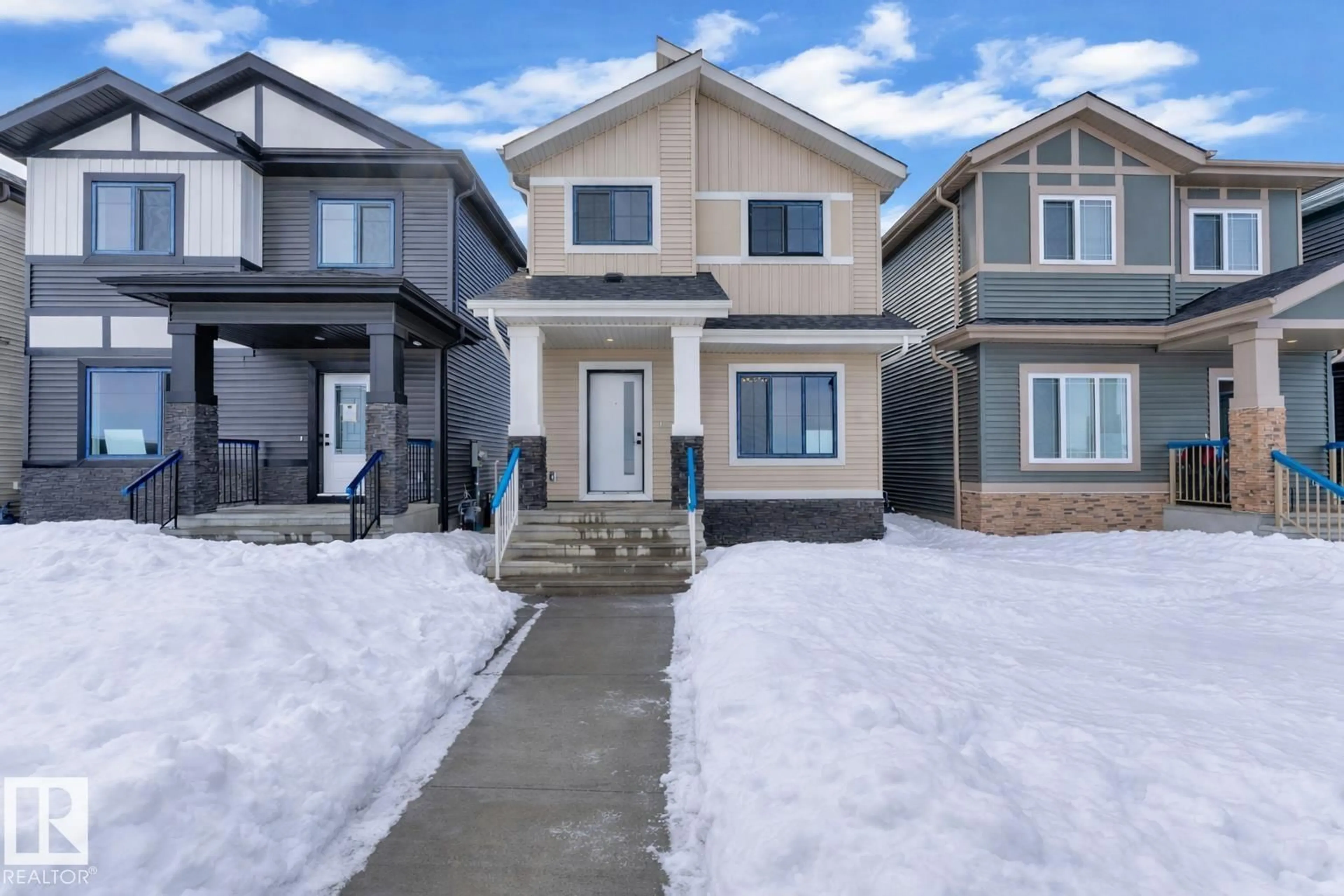 Home with vinyl exterior material, street for 9827 107A AV, Morinville Alberta T8R2P1