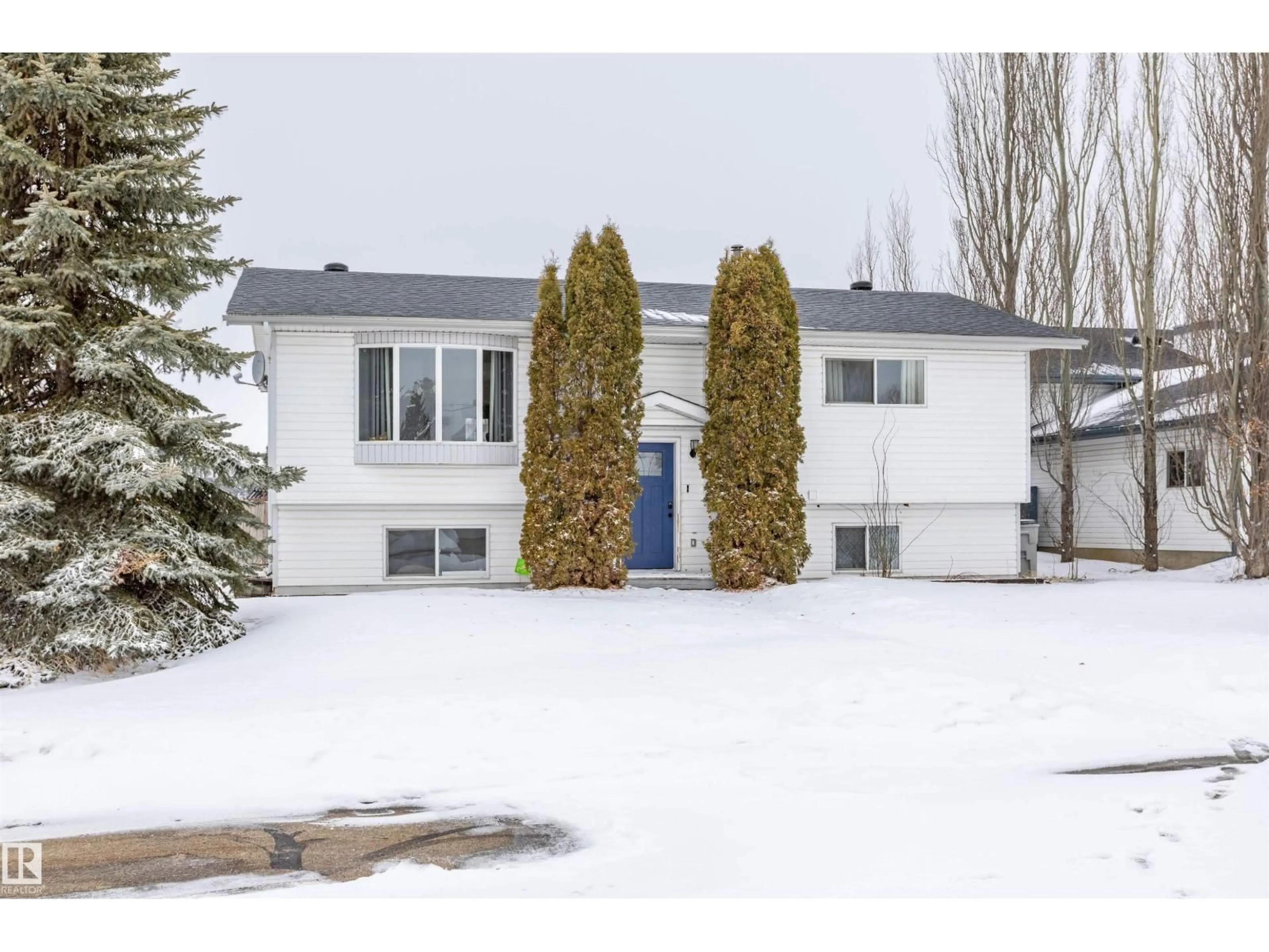 Home with vinyl exterior material, street for 5210 52A ST, Legal Alberta T0G1L0