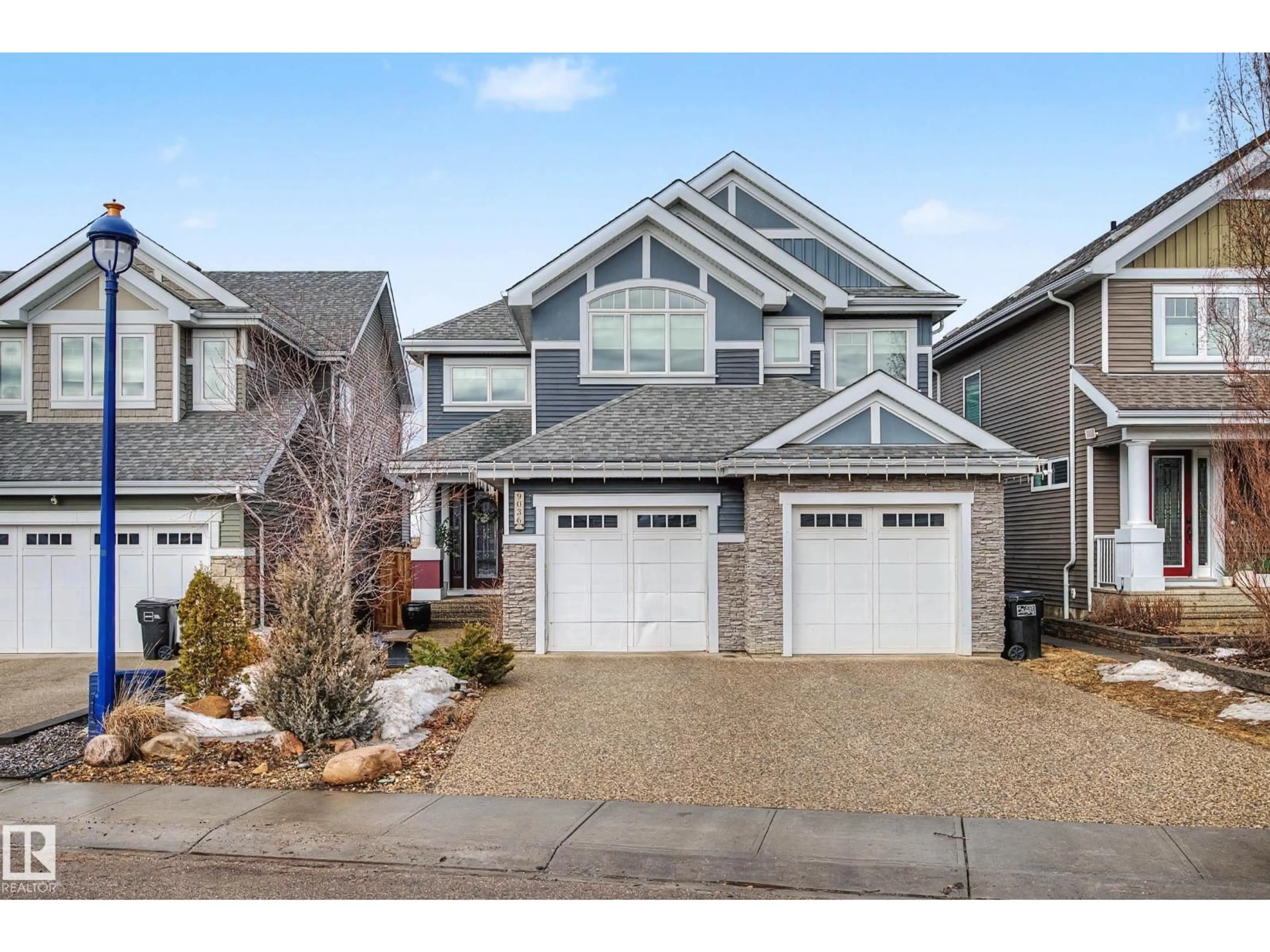 Home with brick exterior material, street for SW - 9036 24 AV, Edmonton Alberta T6X2C4