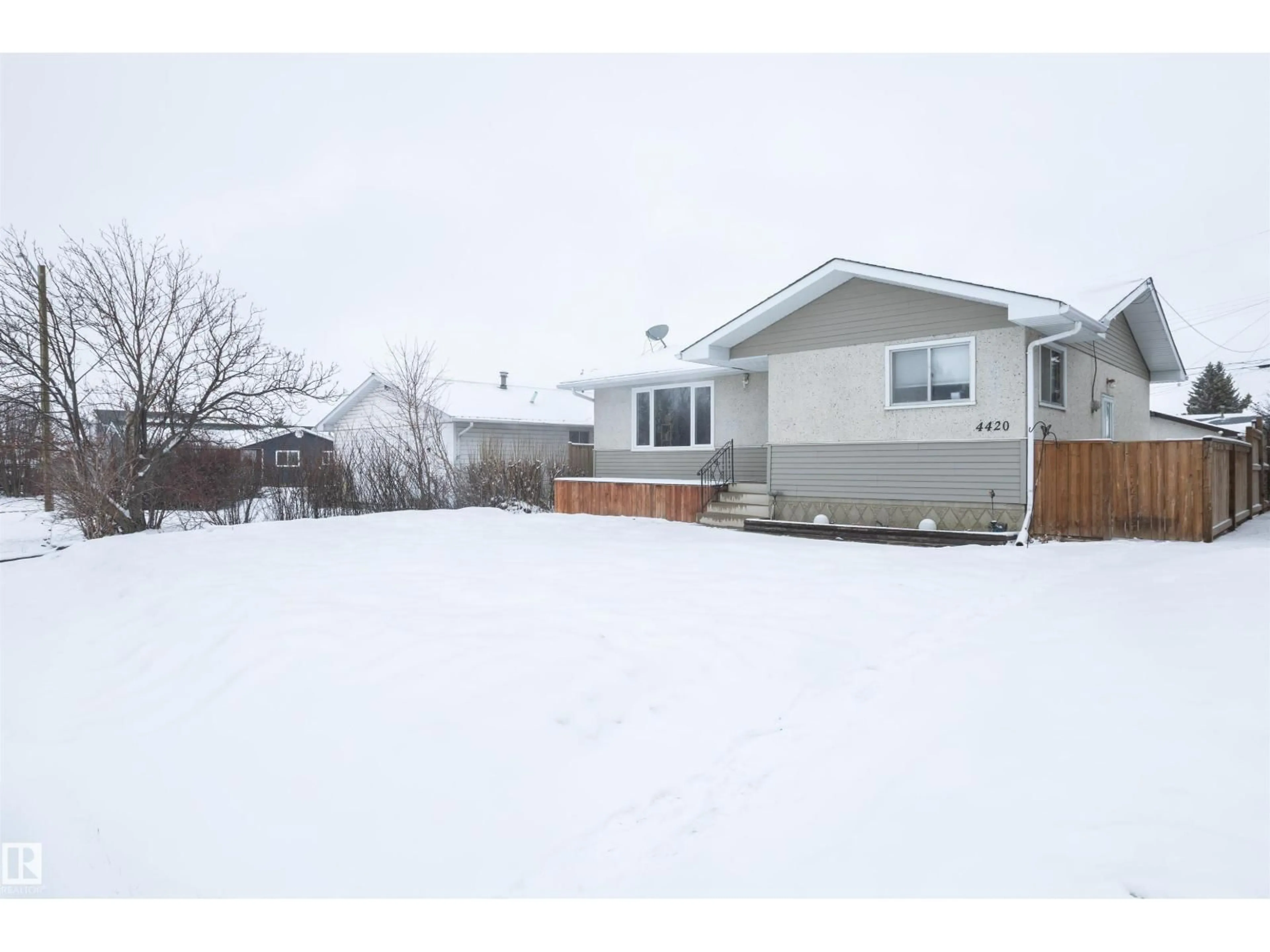 A pic from outside/outdoor area/front of a property/back of a property/a pic from drone, street for 4420 56 AV, Barrhead Alberta T7N1K6