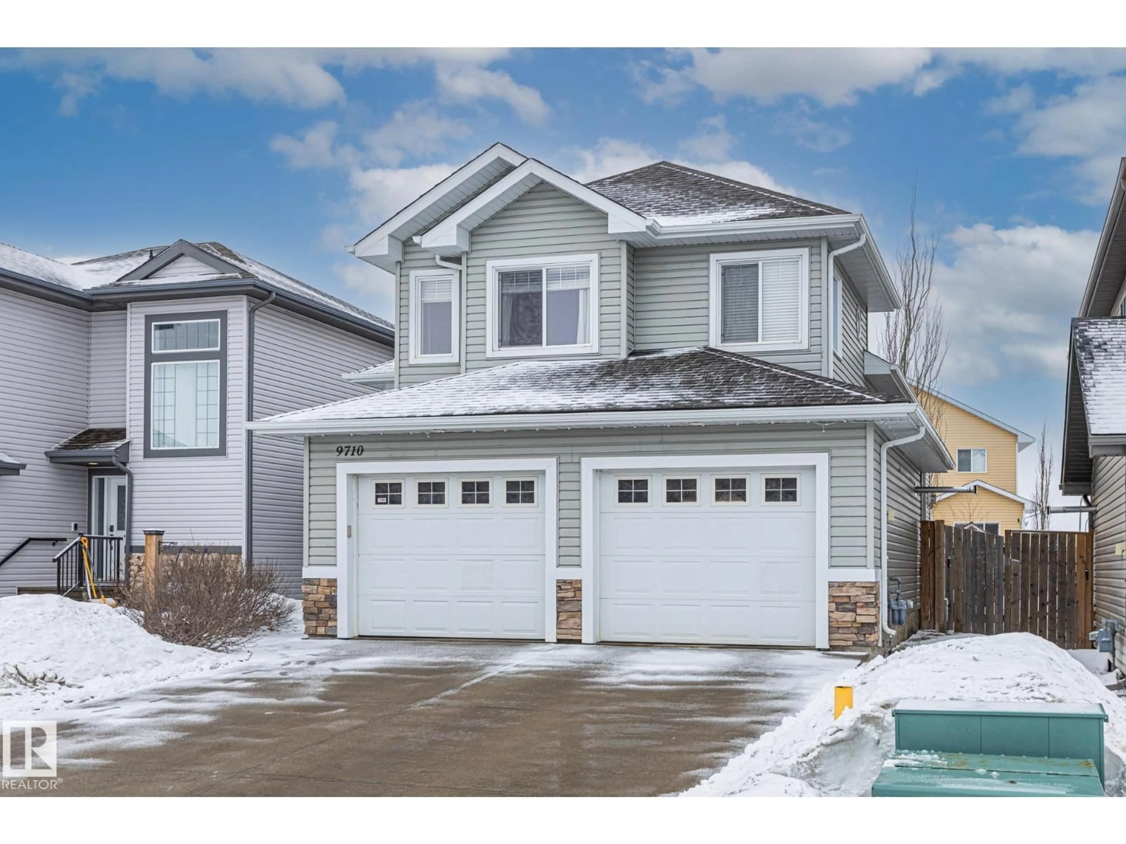 Home with vinyl exterior material, street for 9710 88 ST, Morinville Alberta T8R0C5