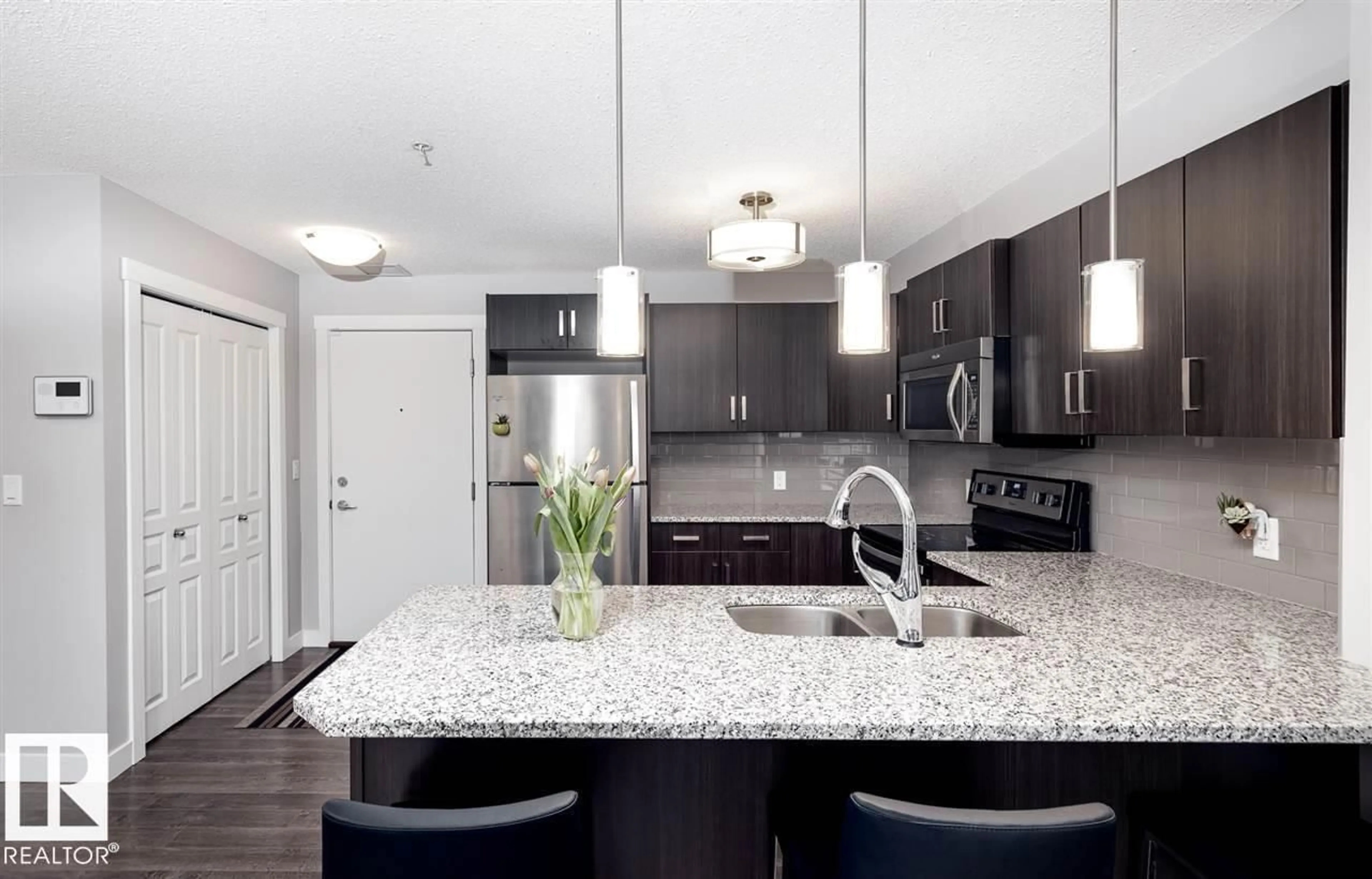 Open concept kitchen, unknown for #111 - 2229 44 AV, Edmonton Alberta T6T0W6