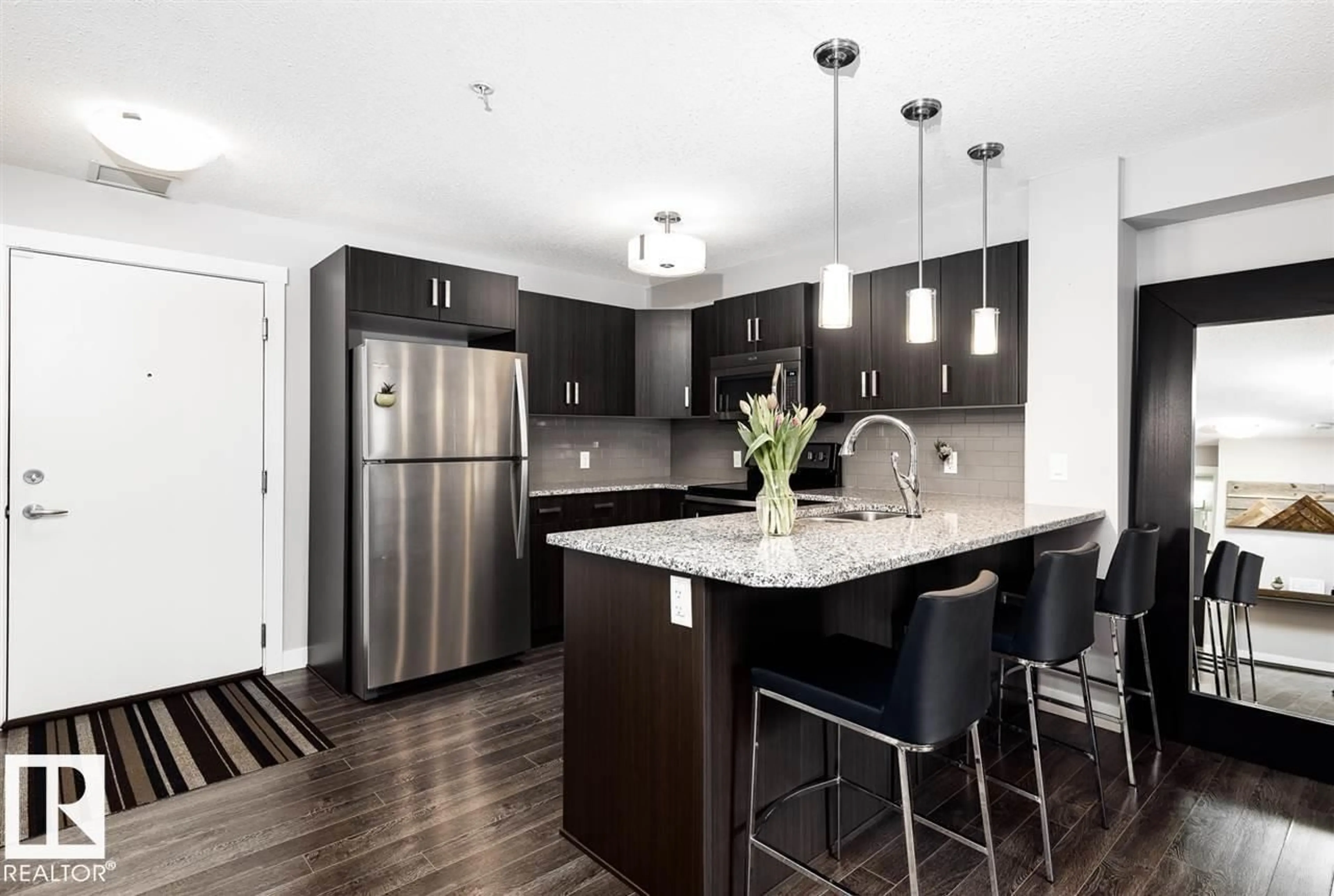 Open concept kitchen, unknown for #111 - 2229 44 AV, Edmonton Alberta T6T0W6