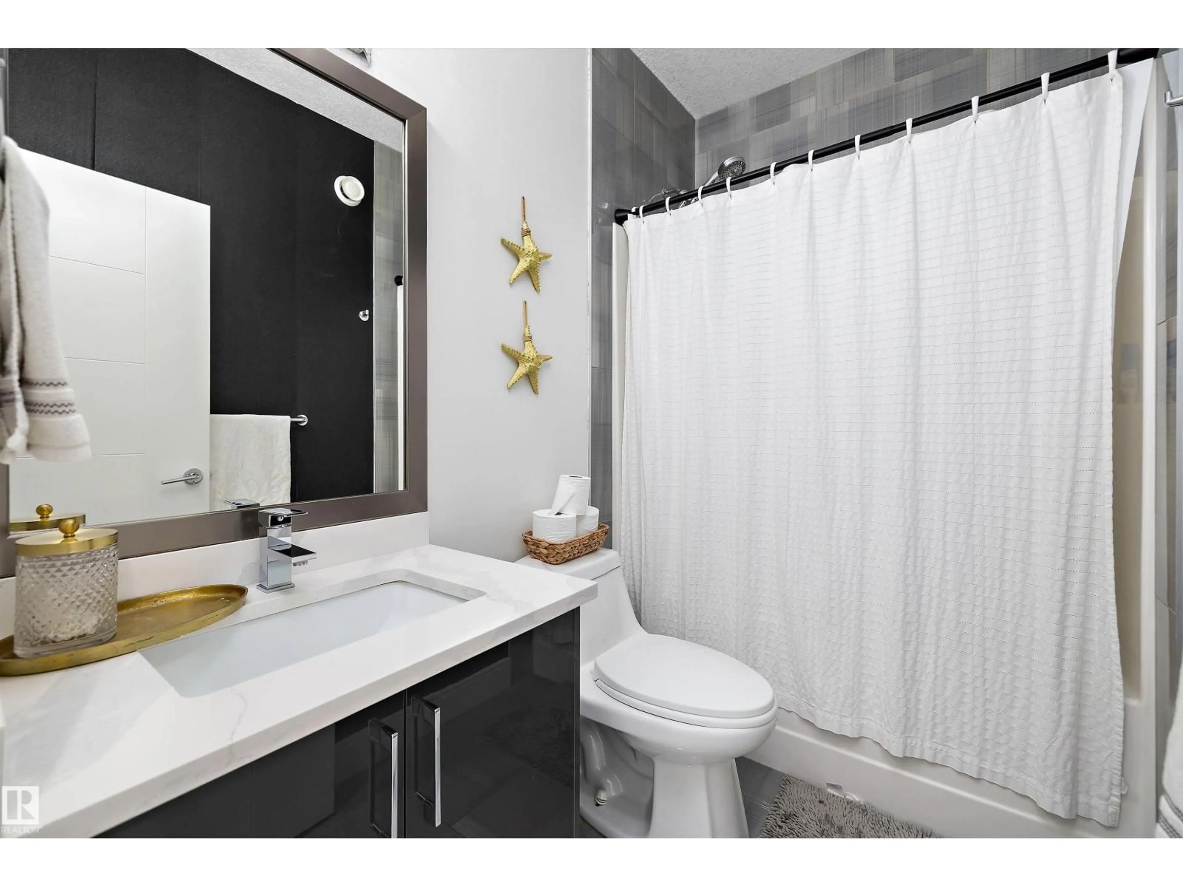 Standard bathroom, ceramic/tile floor for 6303 169 AV, Edmonton Alberta T5Y3V4