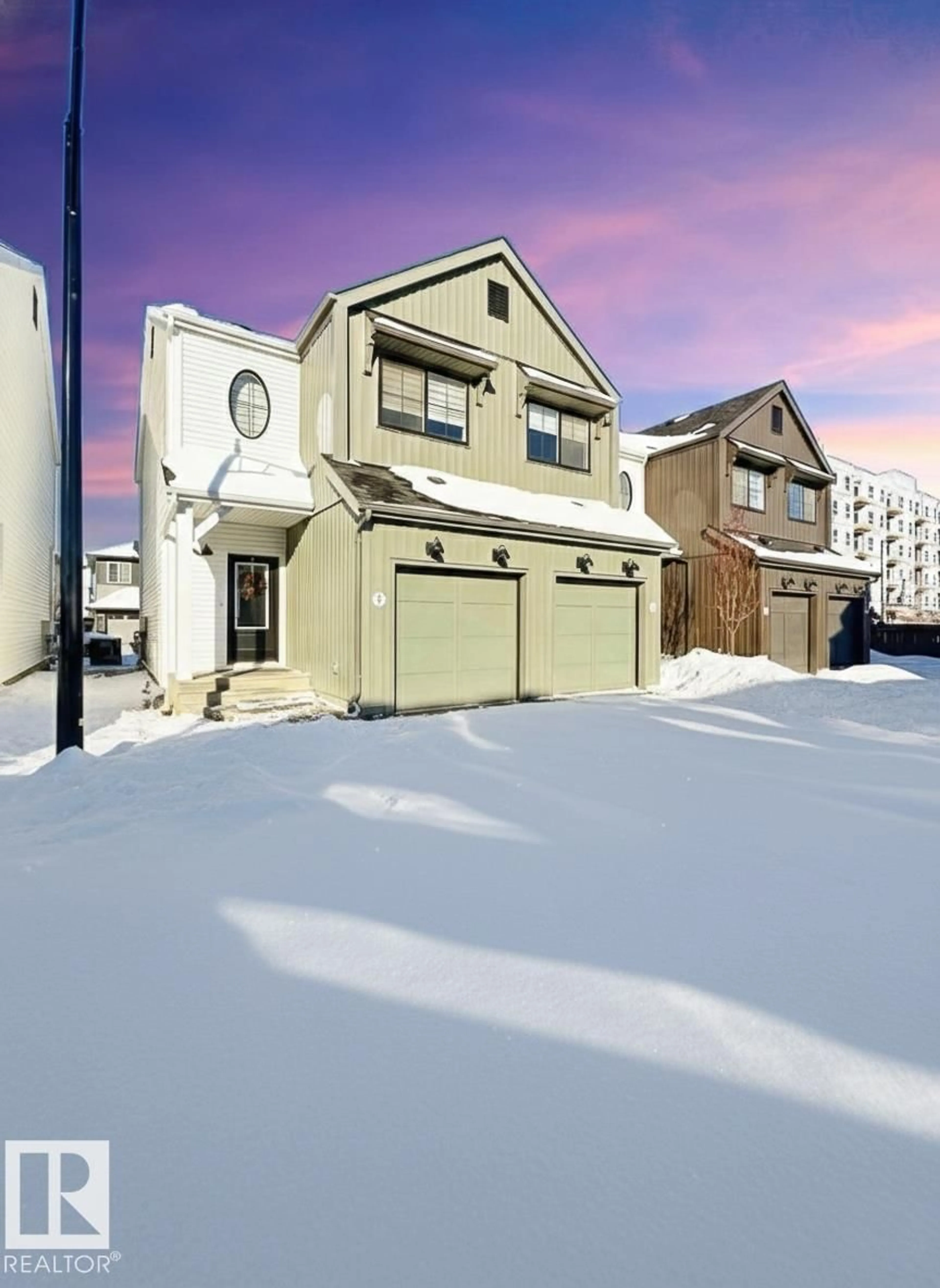 Home with vinyl exterior material, street for Unit 9 - 1910 COLLIP VIEW SW, Edmonton Alberta T6W5H4