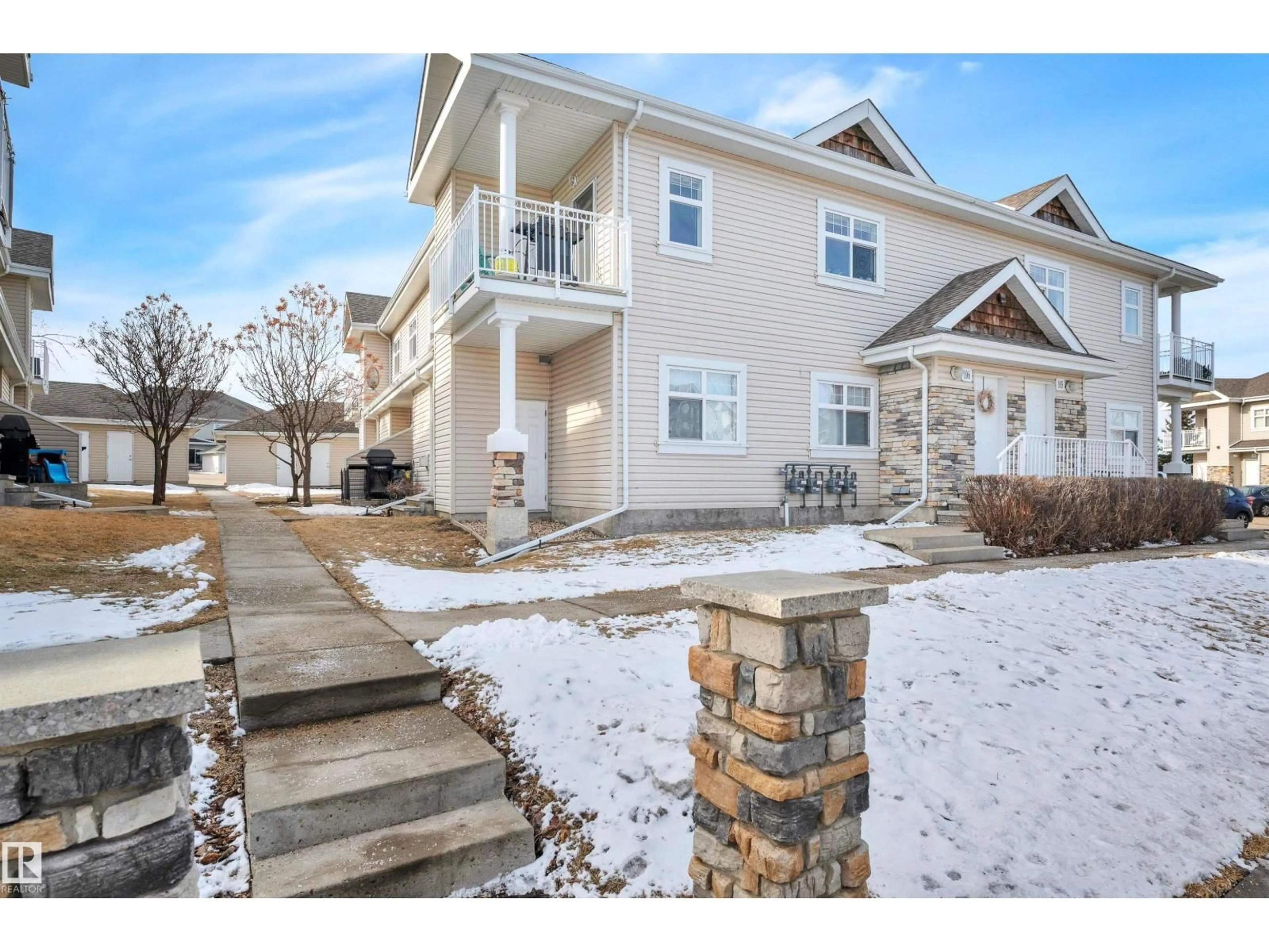 Home with vinyl exterior material, street for #106 - 3040 SPENCE WD, Edmonton Alberta T6X1N7