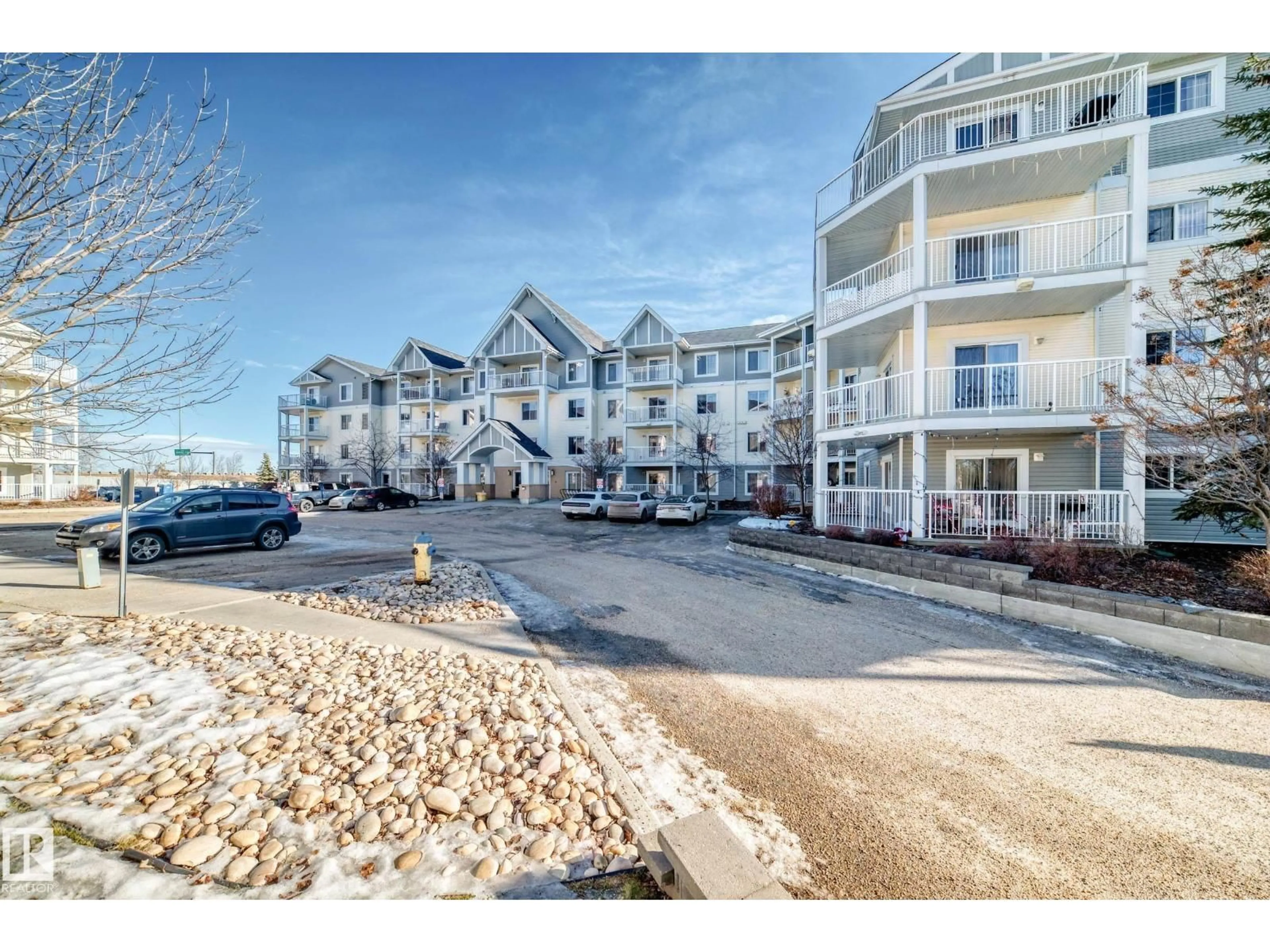 A pic from outside/outdoor area/front of a property/back of a property/a pic from drone, mountain view for 208 - 2204 44 AVE NW, Edmonton Alberta T6T0G5