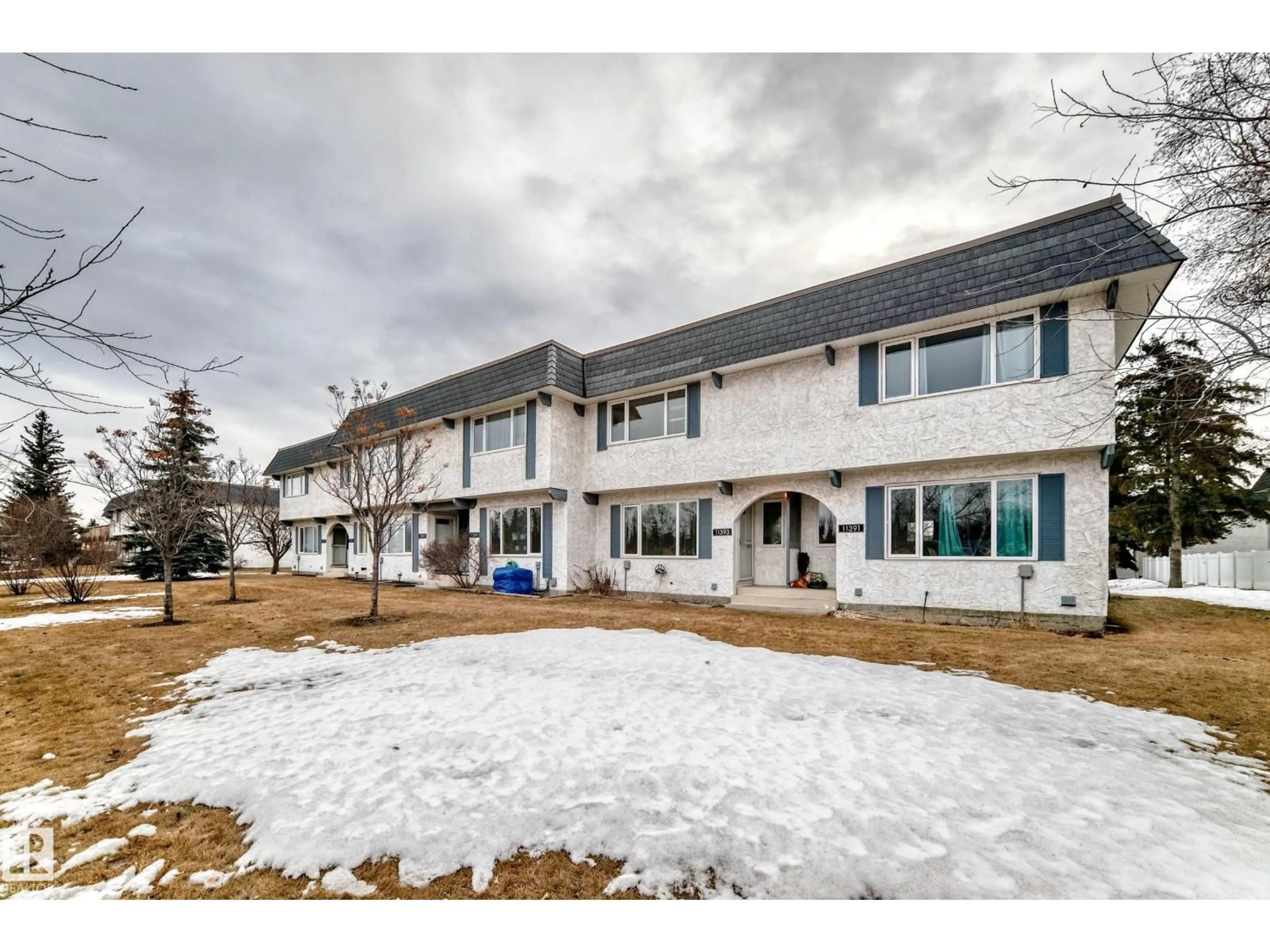 A pic from outside/outdoor area/front of a property/back of a property/a pic from drone, street for 11393 22 AV, Edmonton Alberta T6J4V8