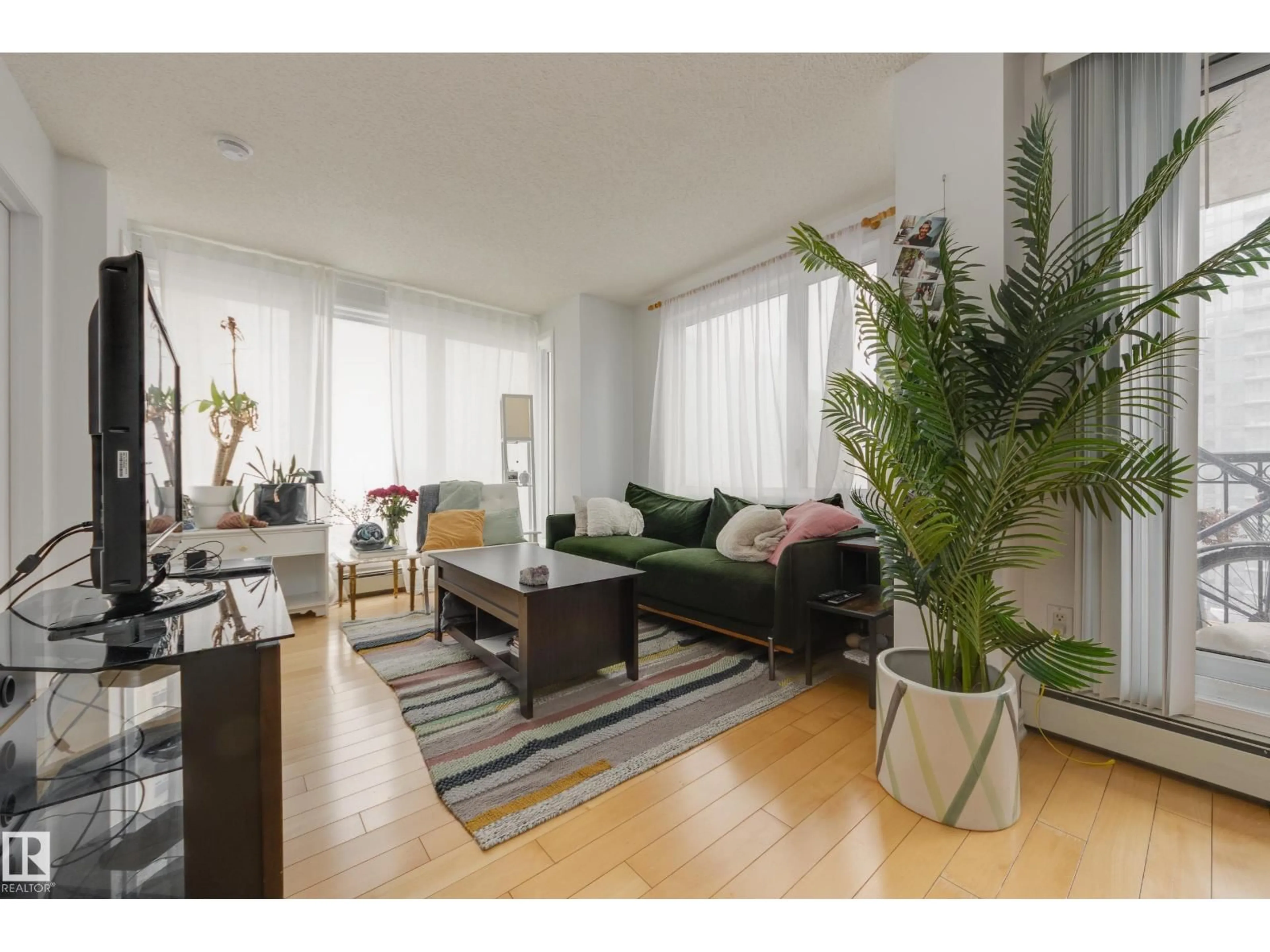 Living room with furniture, unknown for 1007 - 10180 104 STREET NW, Edmonton Alberta T5J1A7