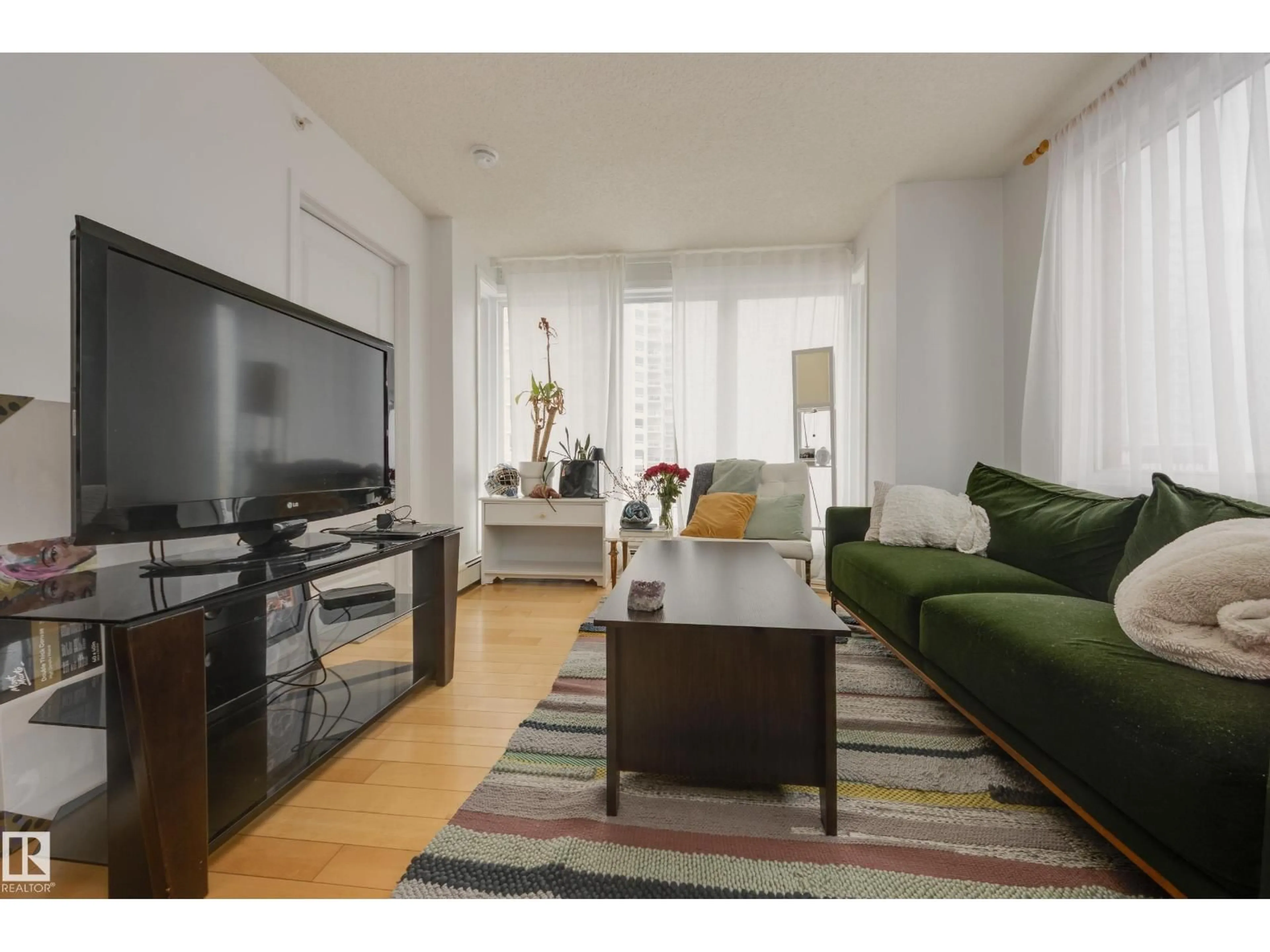 Living room with furniture, unknown for 1007 - 10180 104 STREET NW, Edmonton Alberta T5J1A7