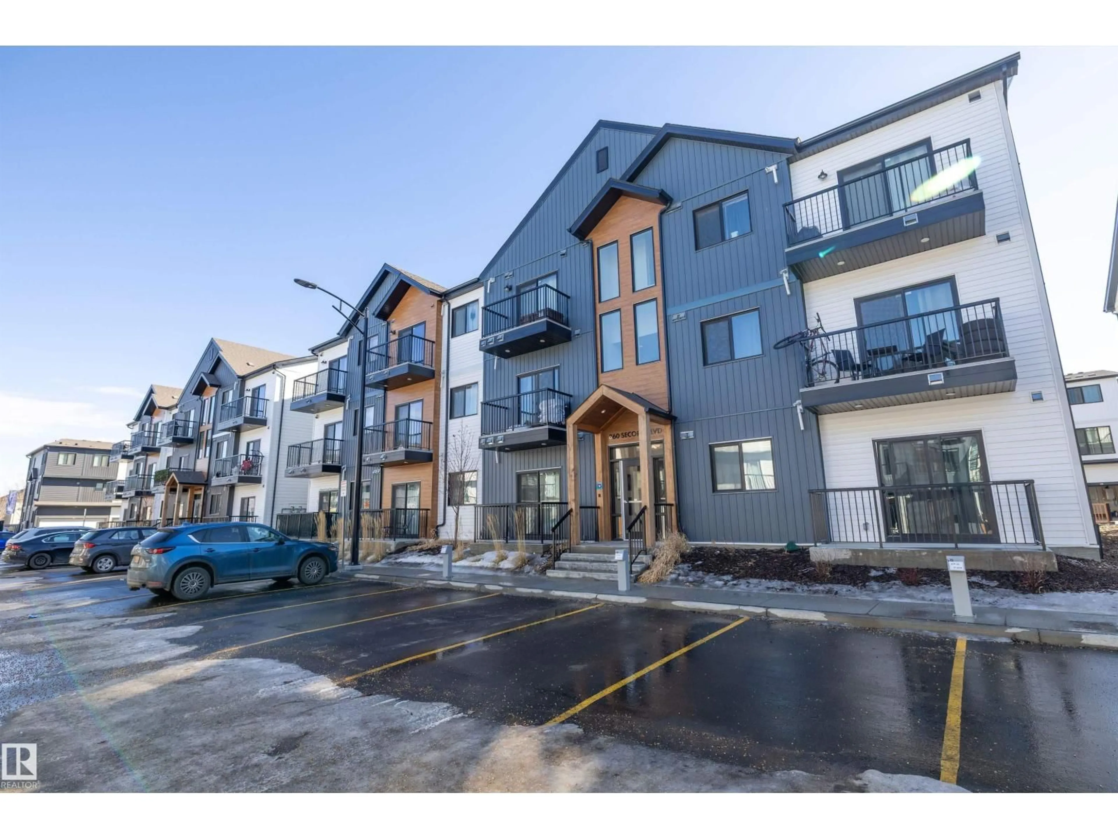 A pic from outside/outdoor area/front of a property/back of a property/a pic from drone, street for #101 - 860 SECORD BLVD, Edmonton Alberta T5T7R0