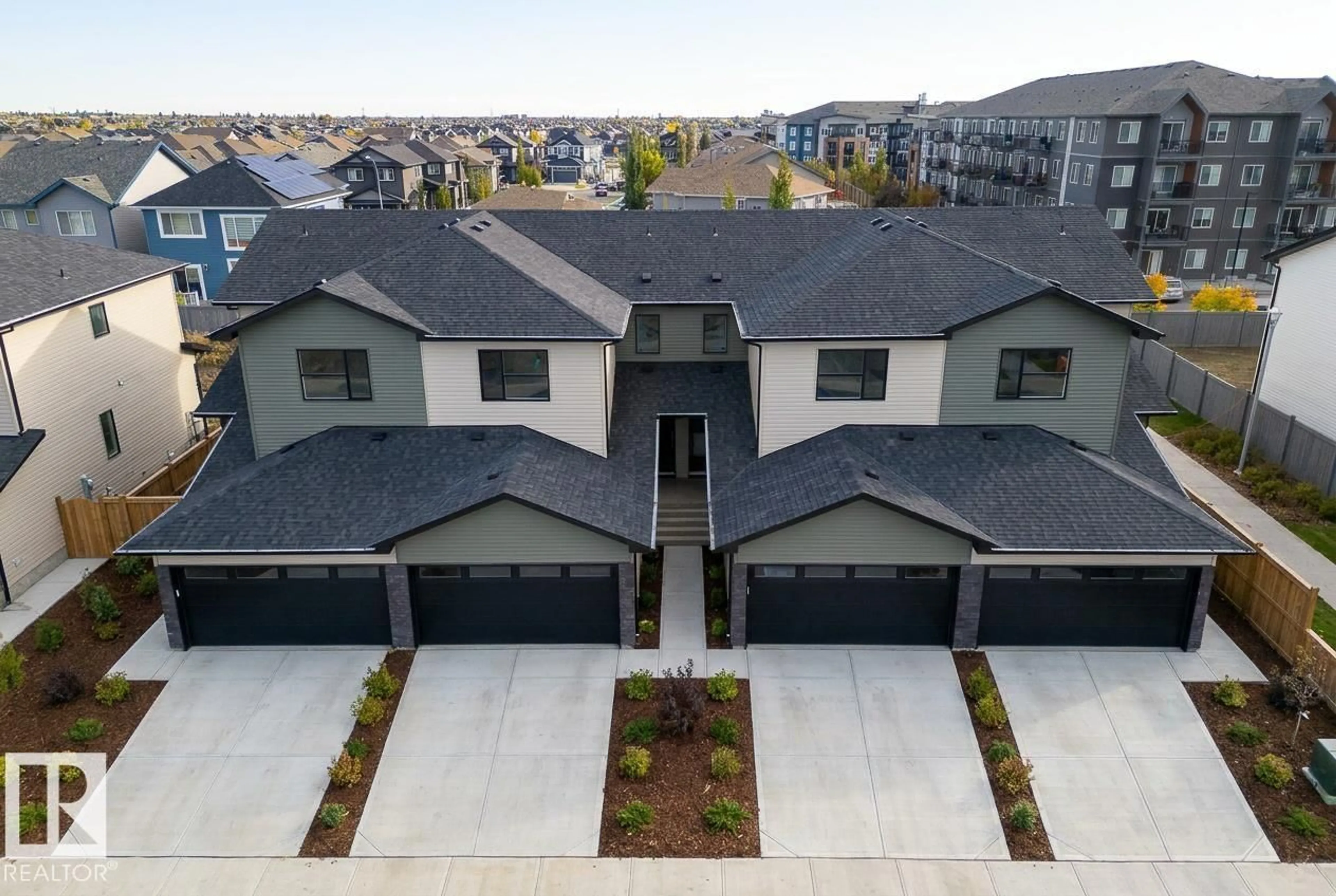 A pic from outside/outdoor area/front of a property/back of a property/a pic from drone, street for 7694 174A AV, Edmonton Alberta T5Z0W5