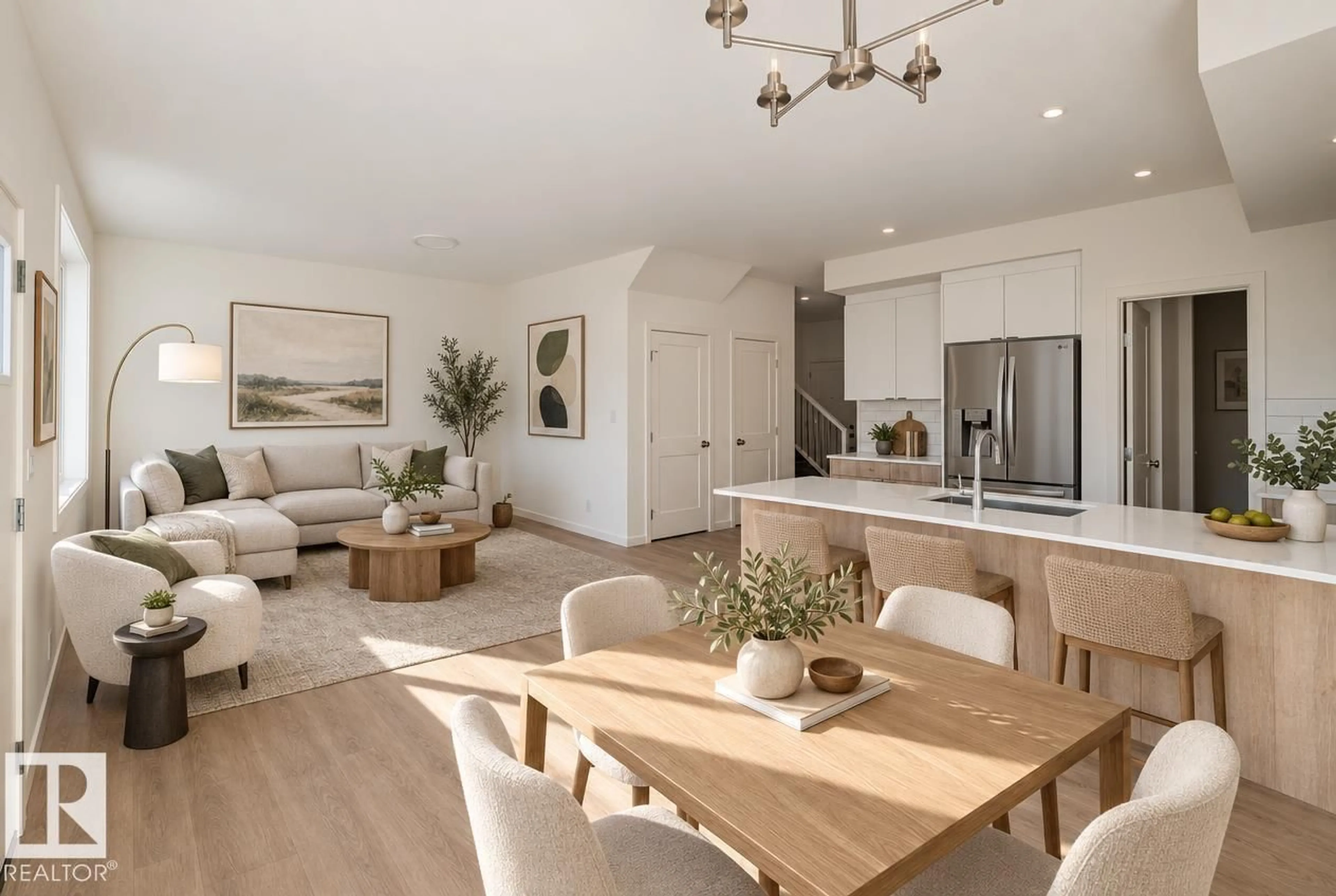 Open concept kitchen, wood/laminate floor for 7694 174A AV, Edmonton Alberta T5Z0W5