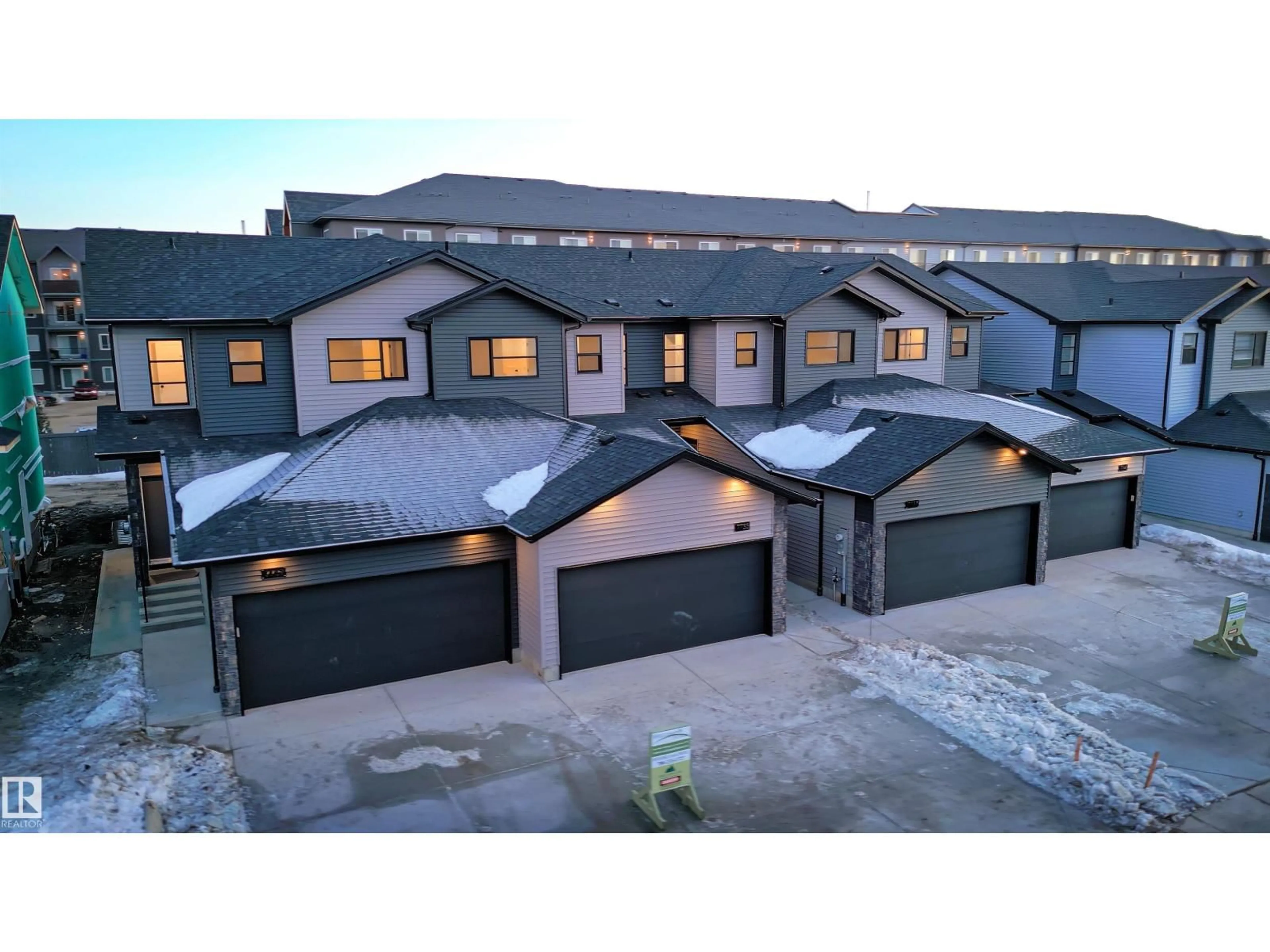 A pic from outside/outdoor area/front of a property/back of a property/a pic from drone, street for 7694 174A AV, Edmonton Alberta T5Z0W5