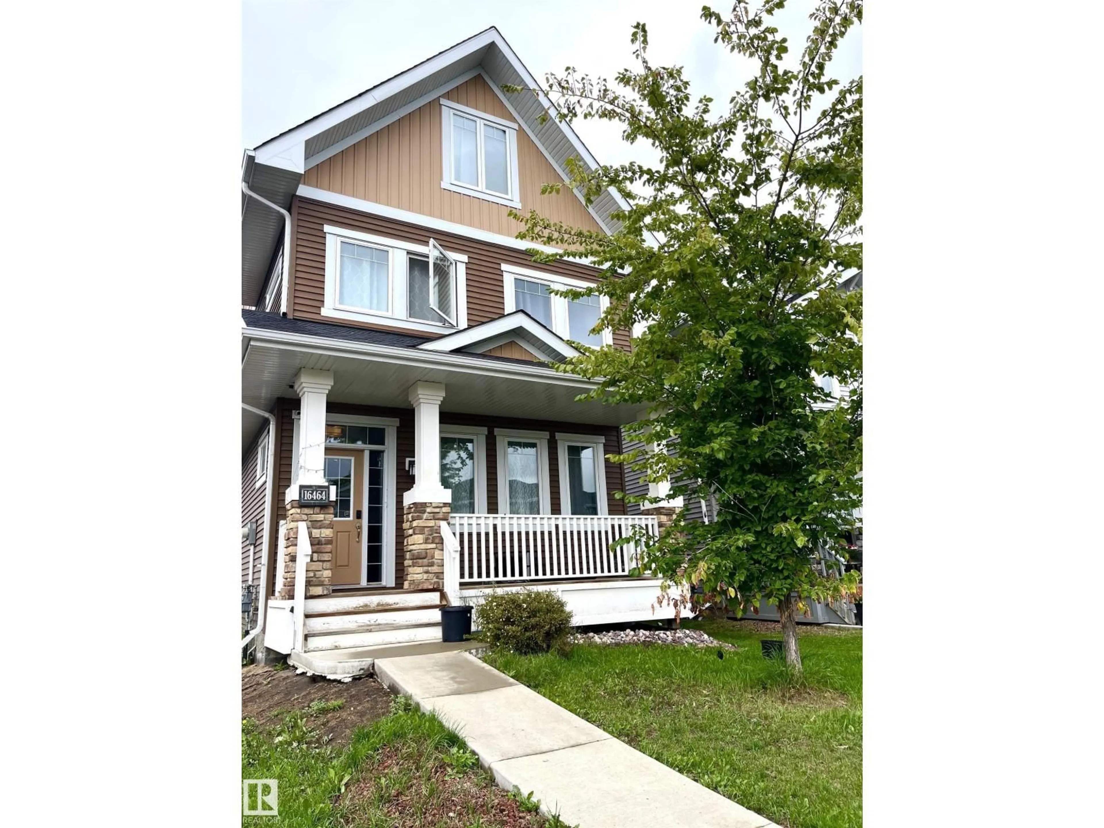 Home with vinyl exterior material, street for SW - 16464 15 AV, Edmonton Alberta T6W2Z7