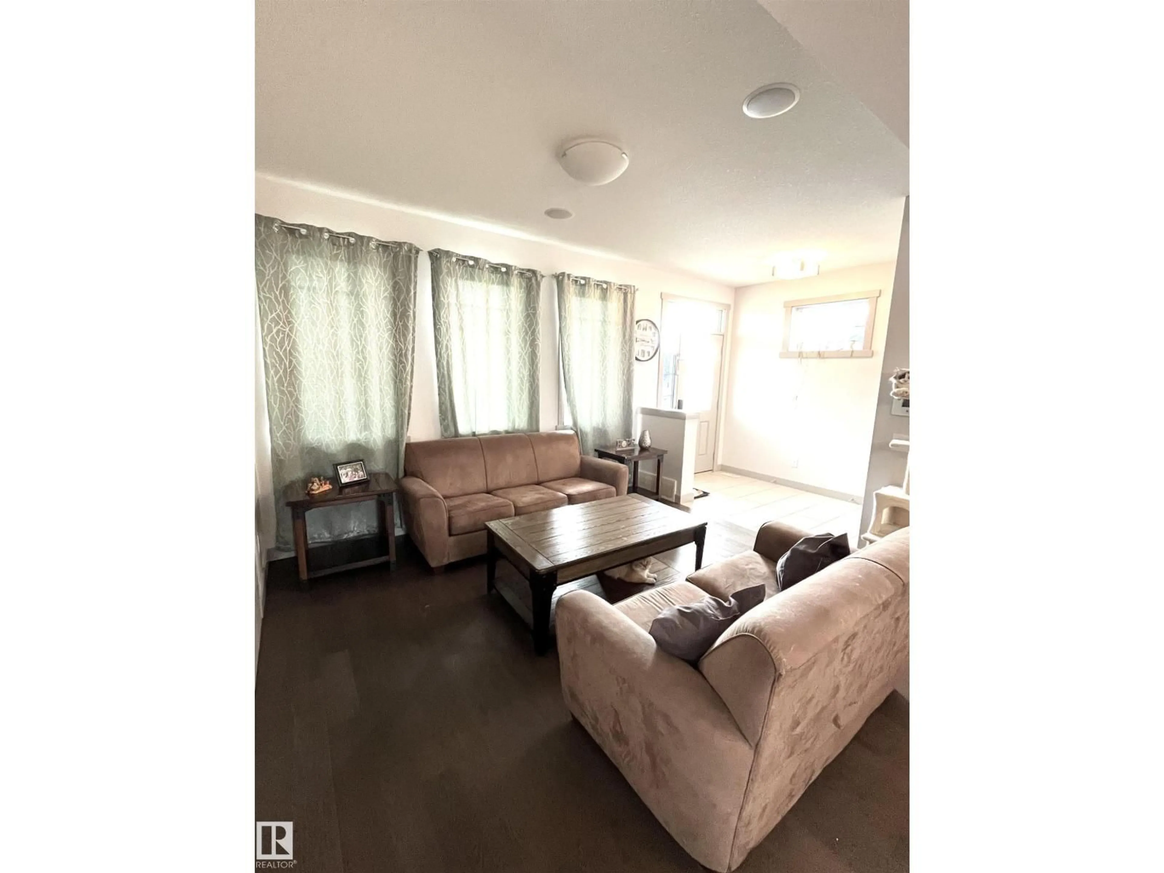 Living room with furniture, unknown for SW - 16464 15 AV, Edmonton Alberta T6W2Z7