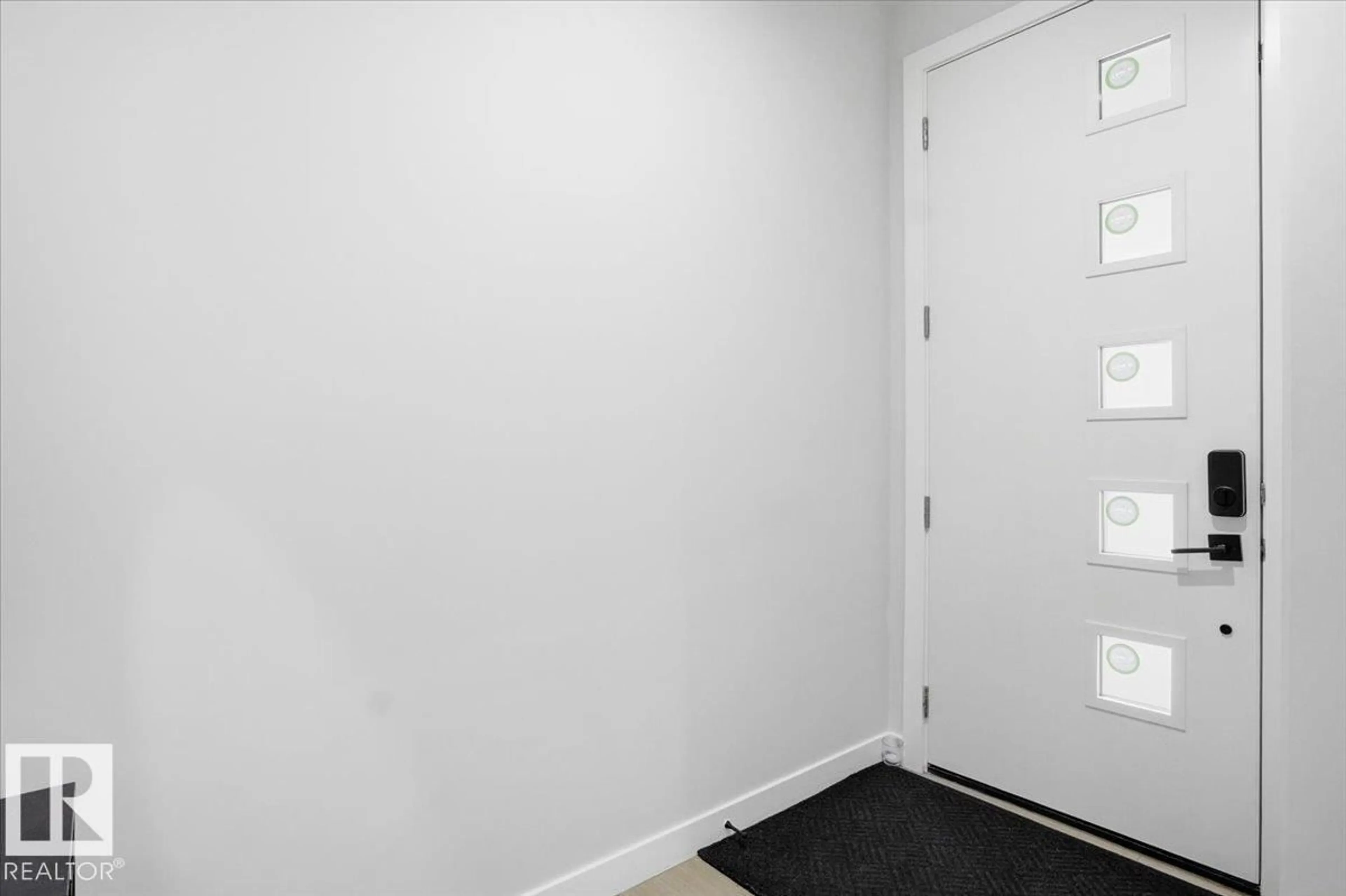 Indoor entryway for 19744 28 AV, Edmonton Alberta T6M1M1