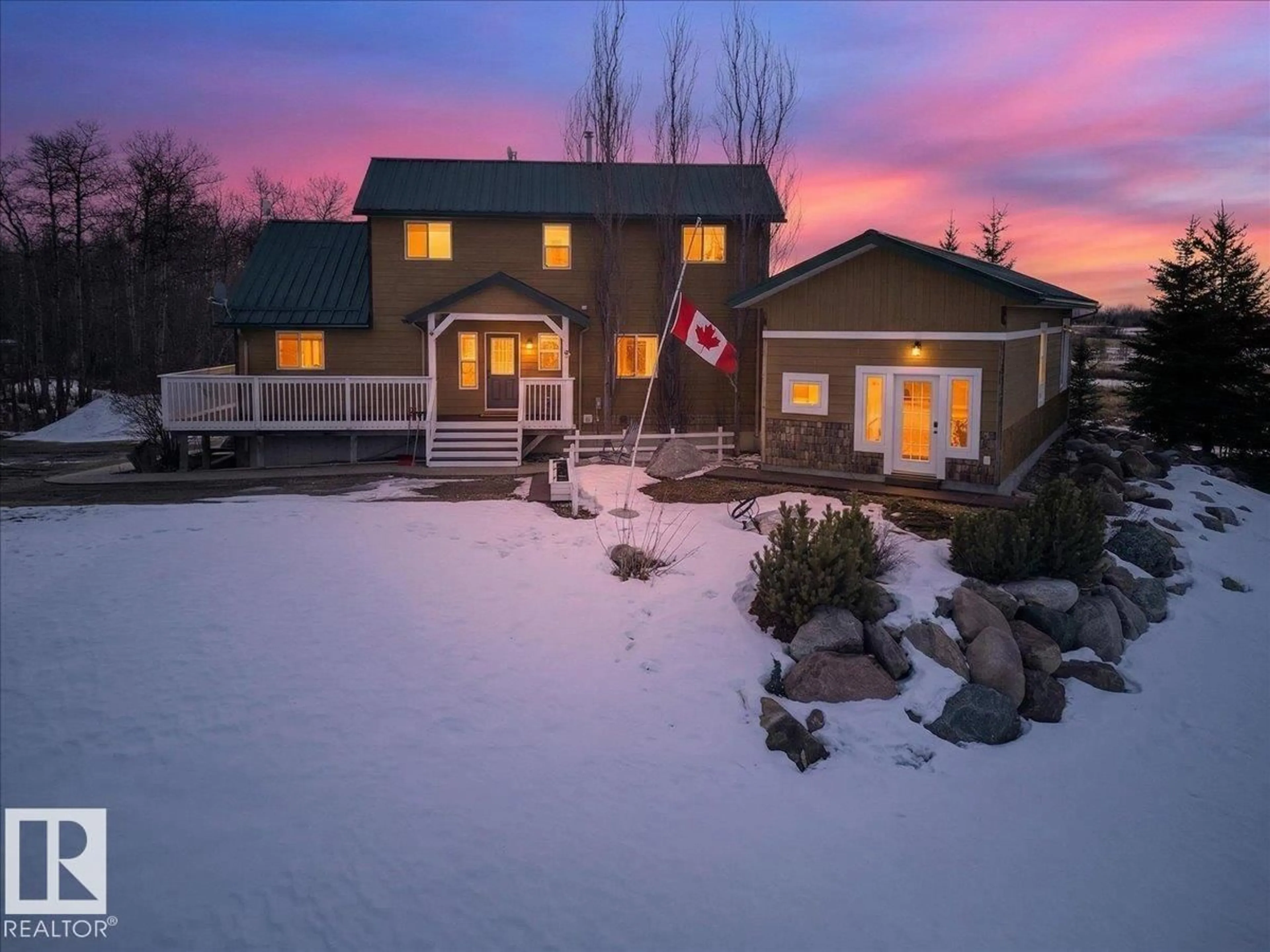 A pic from outside/outdoor area/front of a property/back of a property/a pic from drone, mountain view for 120 50434 RGE RD 232, Rural Leduc County Alberta T4X0L1