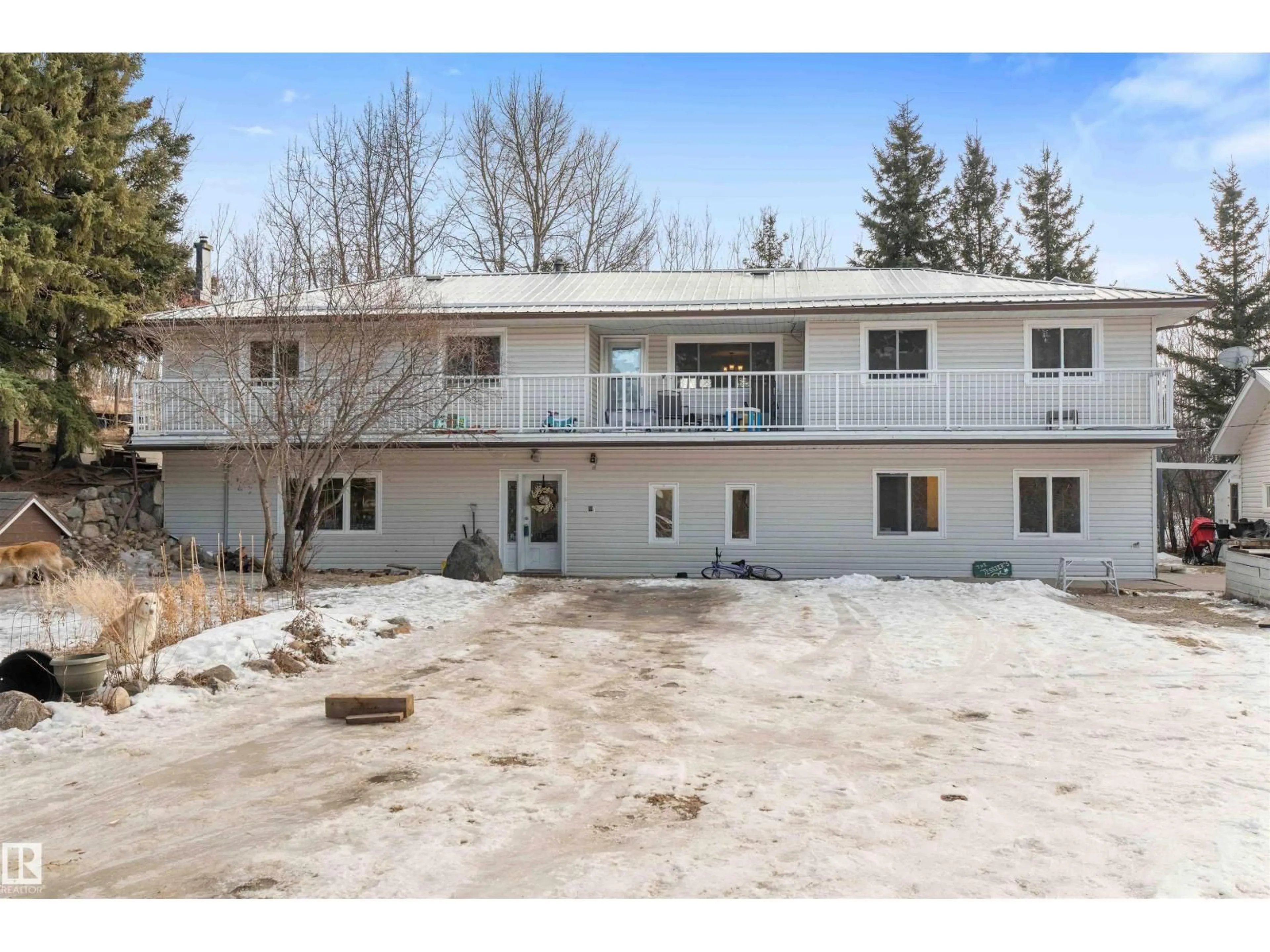 A pic from outside/outdoor area/front of a property/back of a property/a pic from drone, unknown for a - 1417a HWY 16, Rural Parkland County Alberta T7Z1X4