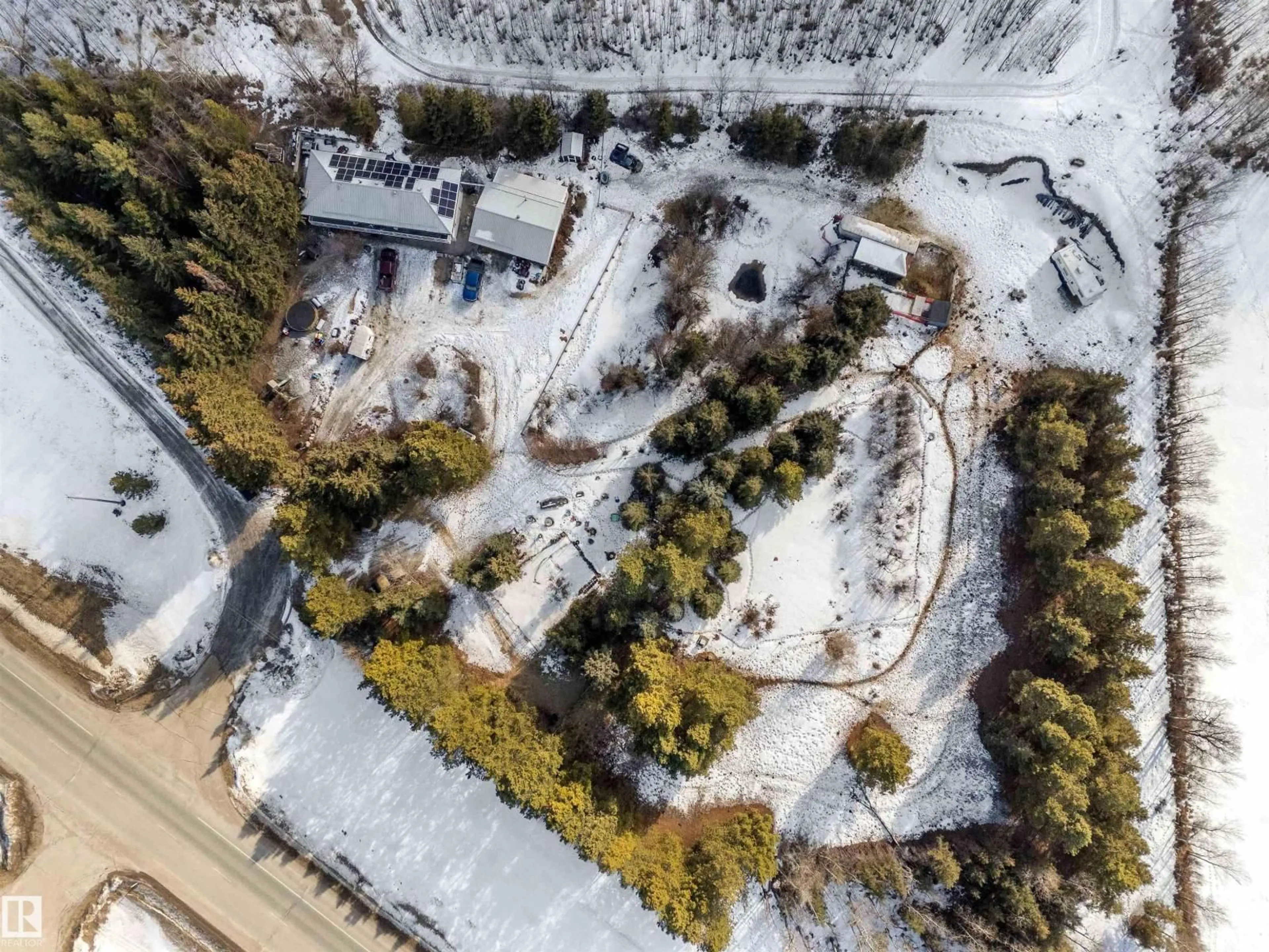 A pic from outside/outdoor area/front of a property/back of a property/a pic from drone, street for a - 1417a HWY 16, Rural Parkland County Alberta T7Z1X4