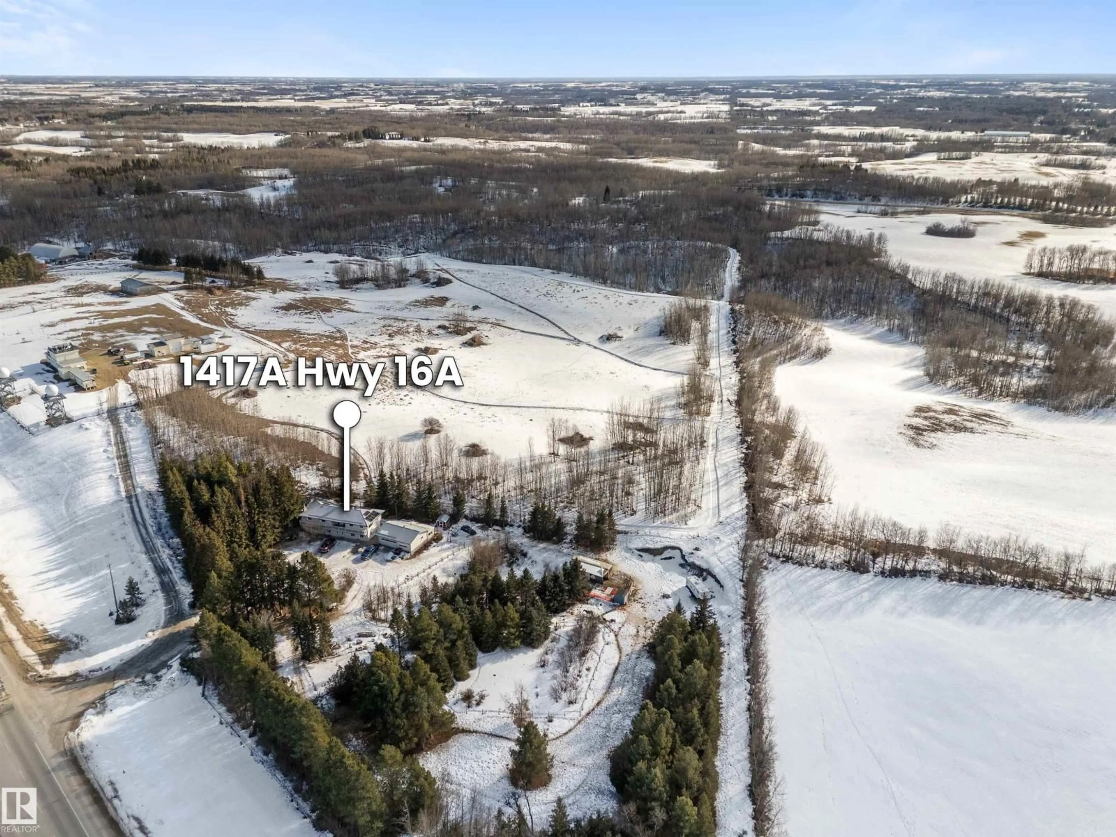 A pic from outside/outdoor area/front of a property/back of a property/a pic from drone, unknown for a - 1417a HWY 16, Rural Parkland County Alberta T7Z1X4